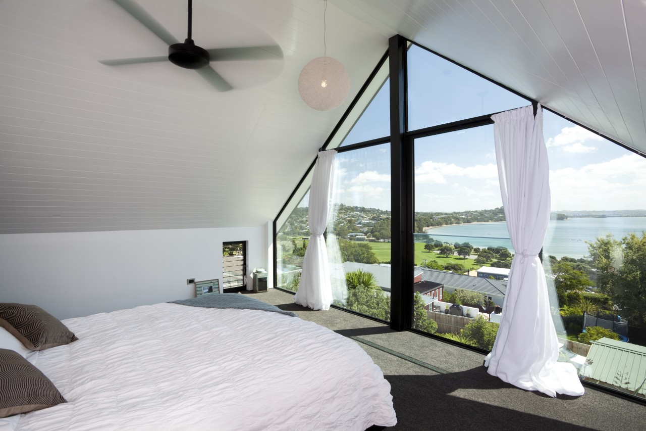 Seen here is a home designed by Chris architecture, bedroom, ceiling, daylighting, estate, home, house, interior design, property, real estate, room, window, gray, white