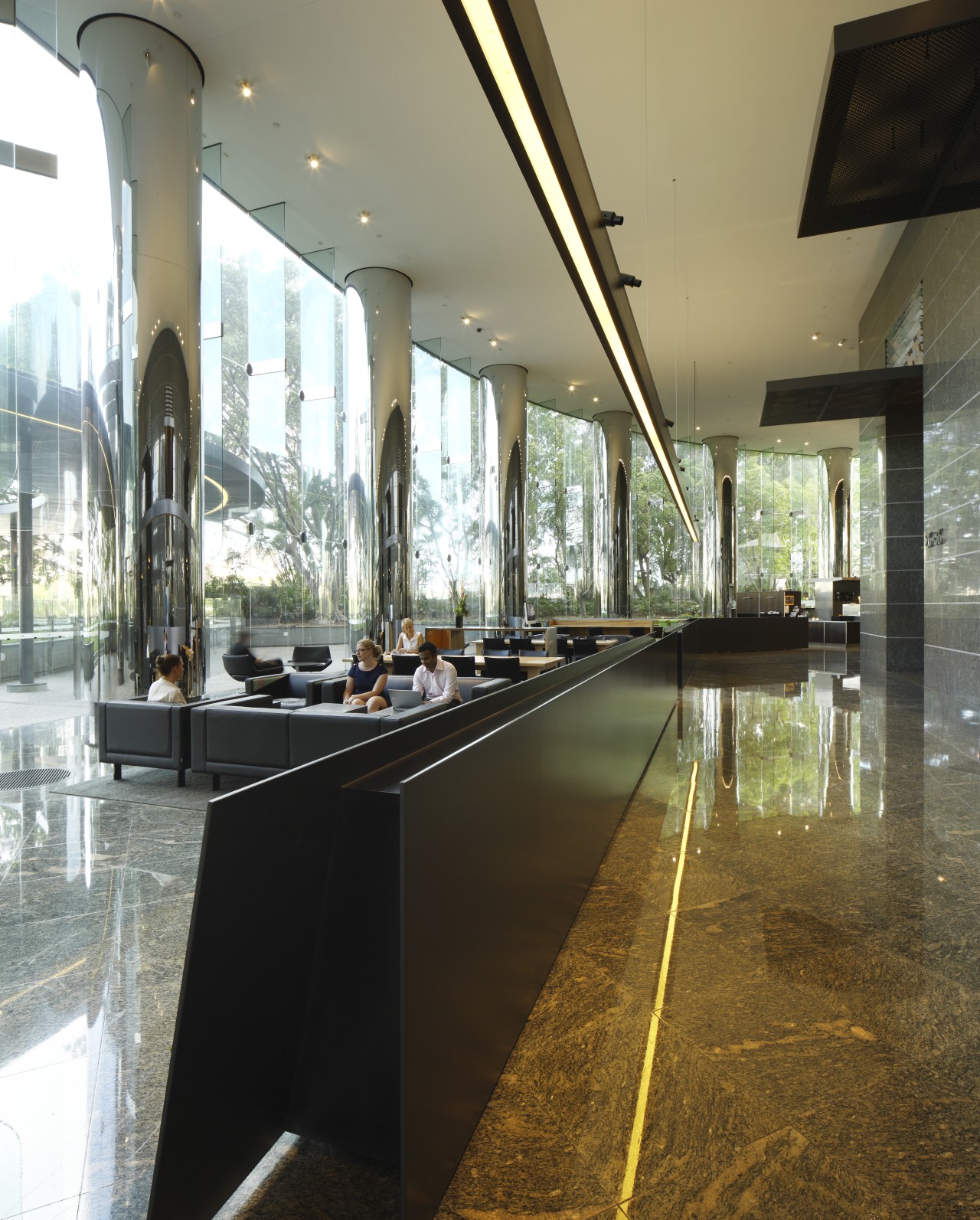 Walkway with black divider. architecture, daylighting, glass, interior design, lobby, tourist attraction, brown