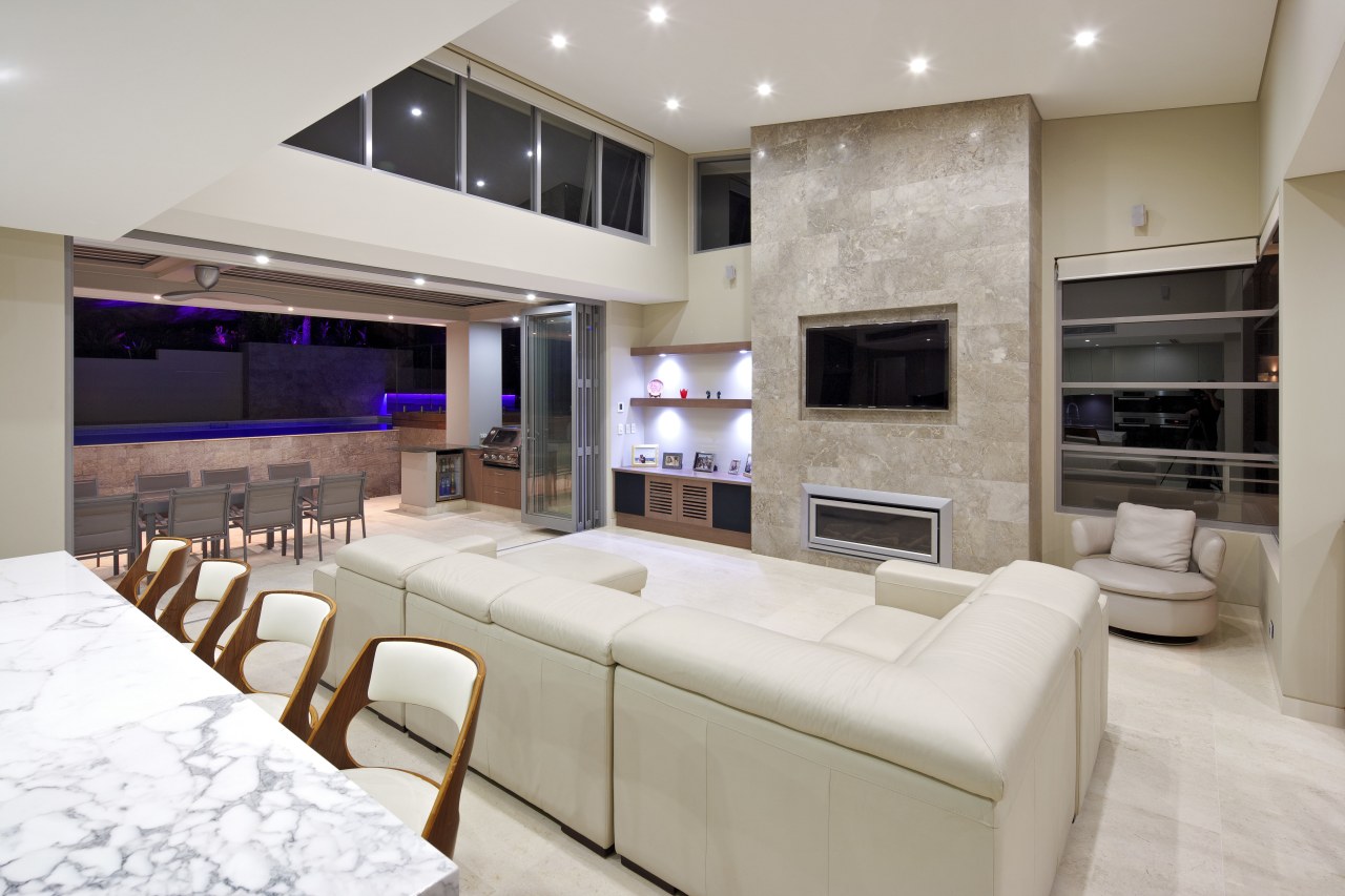 Lounge area with cream couch. ceiling, interior design, living room, gray