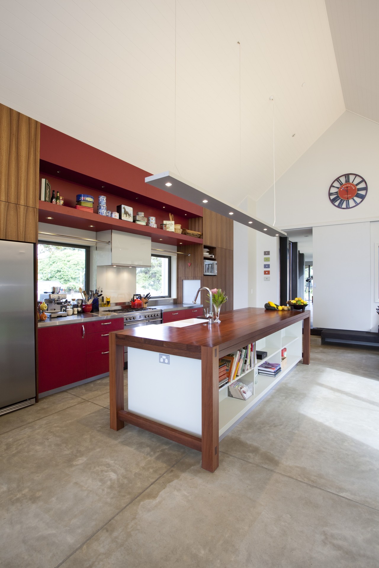 This home was painted with Resene Pohutukawa red, countertop, floor, interior design, kitchen, real estate, white