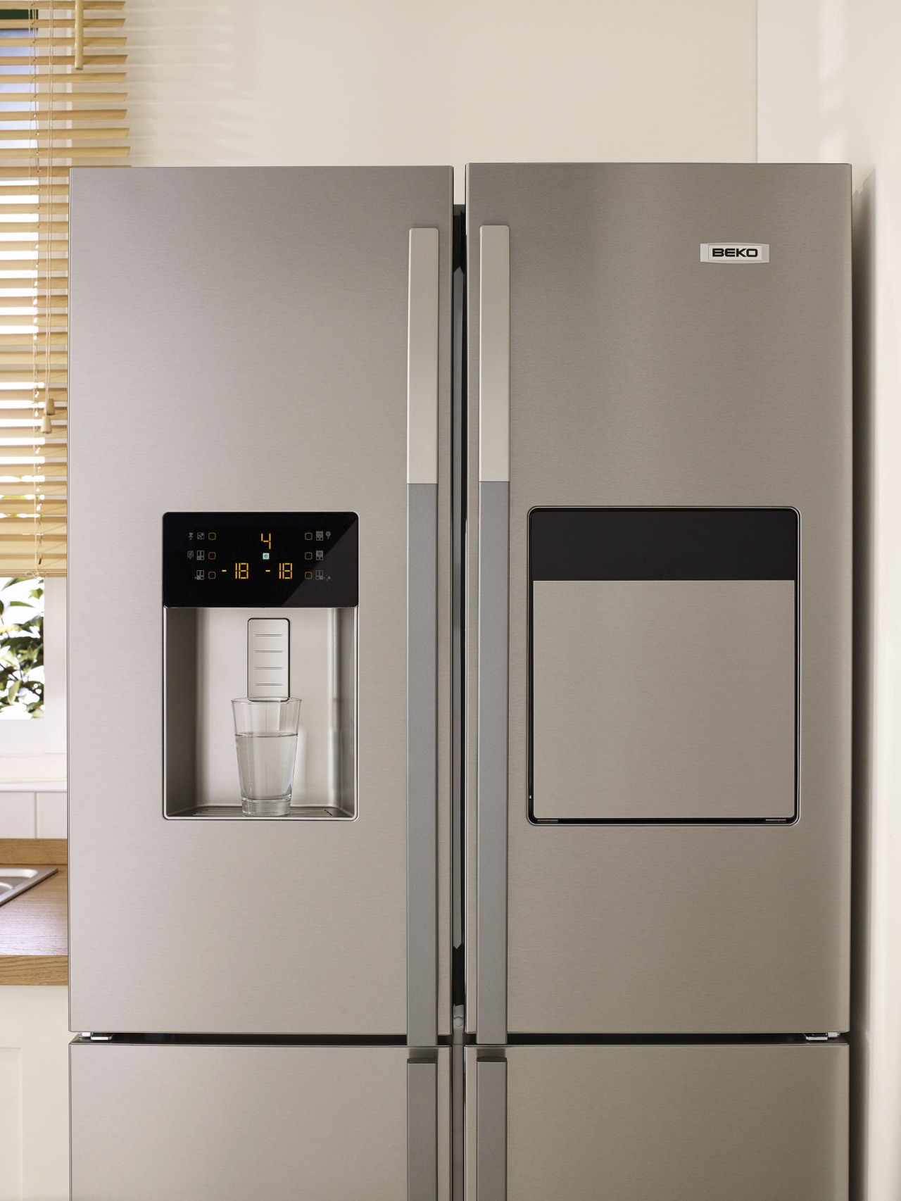 Stainless Beko fridge with ice maker. home appliance, kitchen appliance, major appliance, product, product design, refrigerator, gray