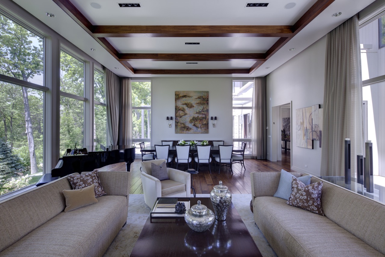 Greys and whites offset wooden floors and ceilings. ceiling, interior design, living room, real estate, window, gray