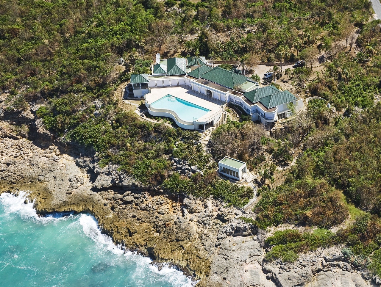 This home was designed by Geoffrey Bradfield. aerial photography, plant community, water, water resources, brown