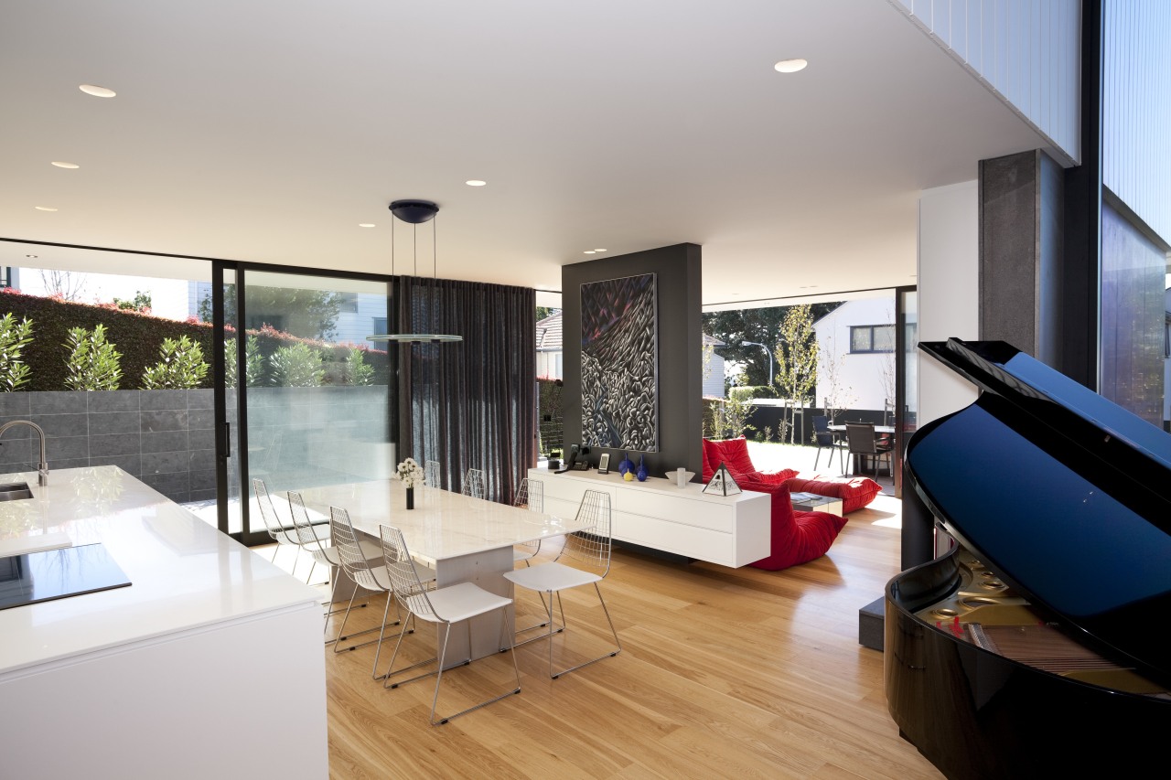 The open-plan living area in this contemporary house architecture, ceiling, house, interior design, living room, real estate, gray