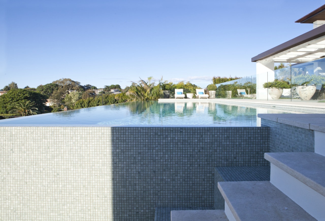 Overview of pool and stairs. condominium, estate, home, house, leisure, property, real estate, resort, swimming pool, villa, teal