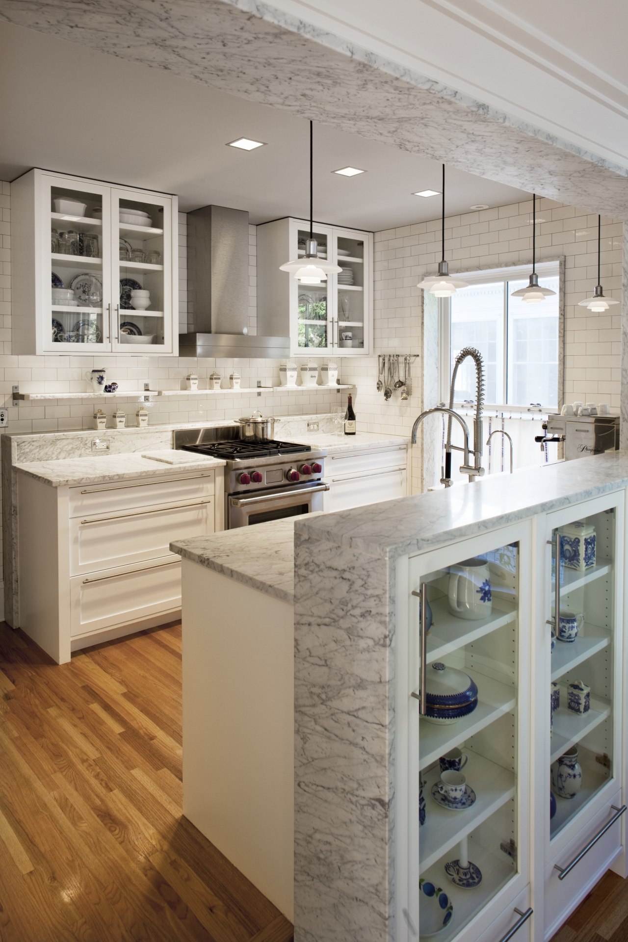 Seen here is a kitchen which was remodelled cabinetry, countertop, cuisine classique, floor, flooring, hardwood, interior design, kitchen, laminate flooring, room, wood flooring, gray