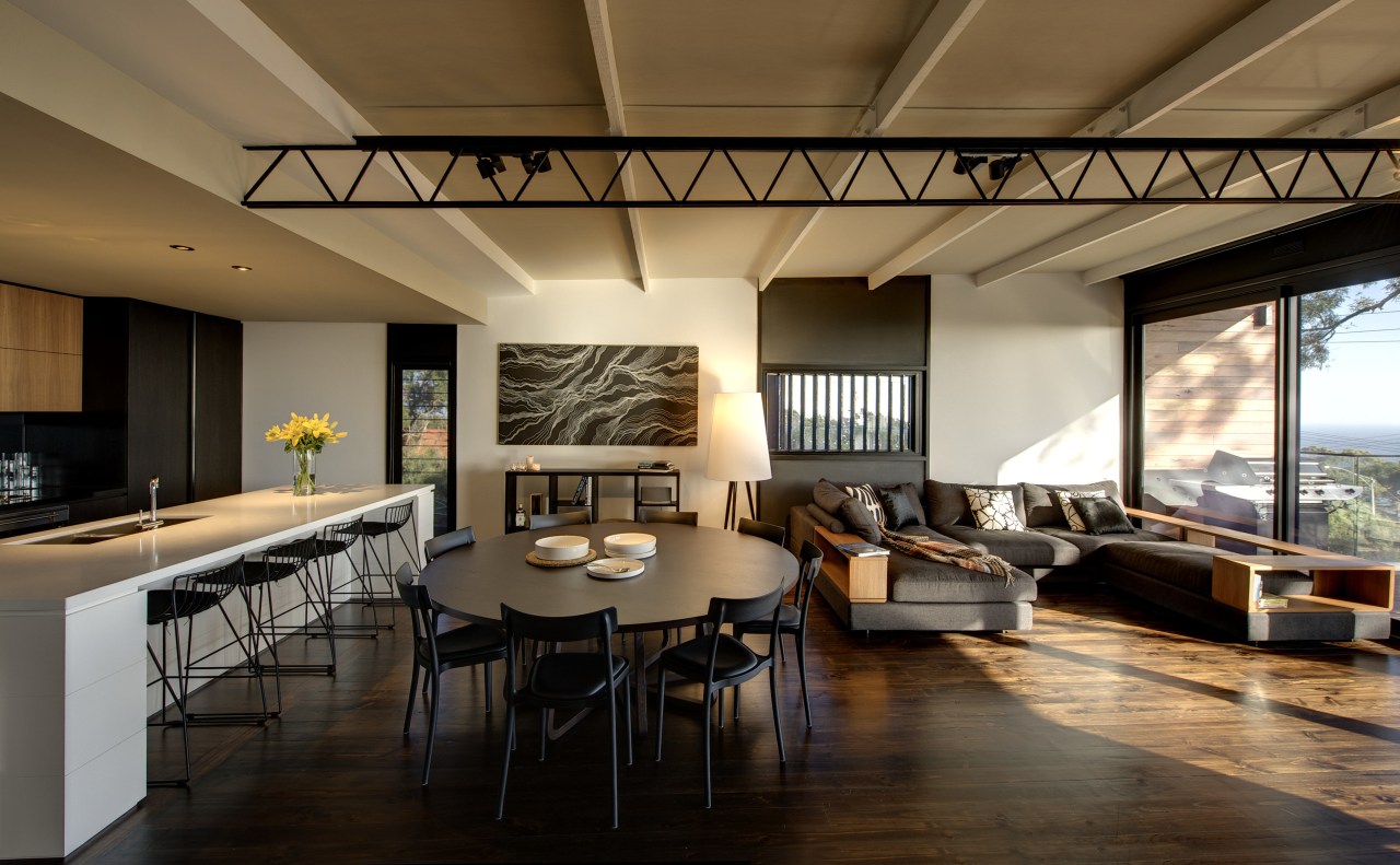 Interior shot of living area with kitchen and ceiling, daylighting, dining room, interior design, living room, real estate, room, table, brown, black