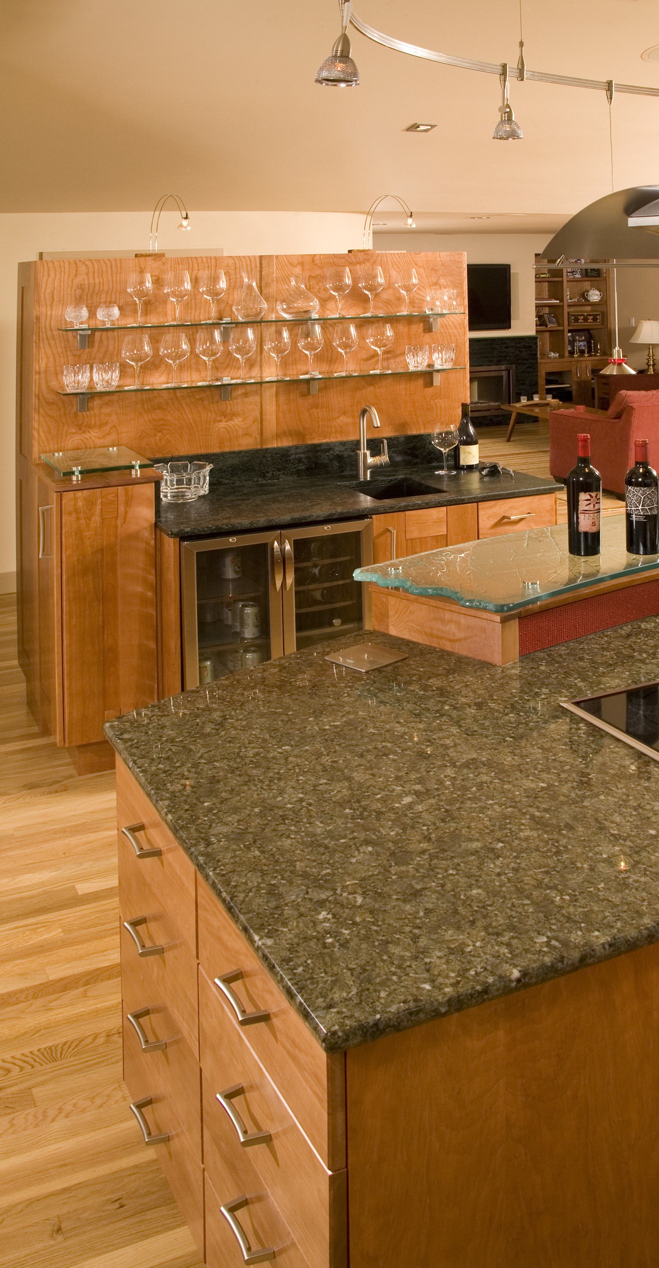 A close up view of a kitchen designed cabinetry, countertop, floor, flooring, hardwood, interior design, kitchen, laminate flooring, room, tile, wood, wood flooring, wood stain, orange, brown