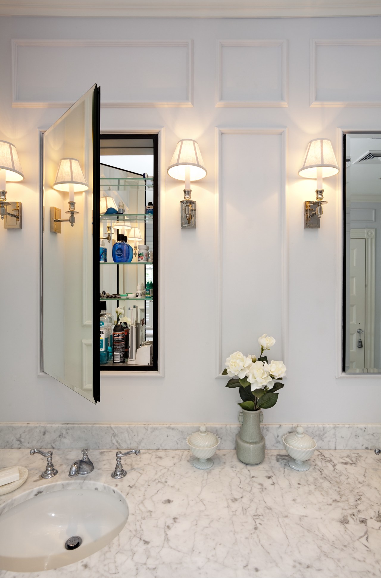 Medicine cabinets have mirrored backs and glass shelving. bathroom, ceiling, floor, home, interior design, room, window, gray