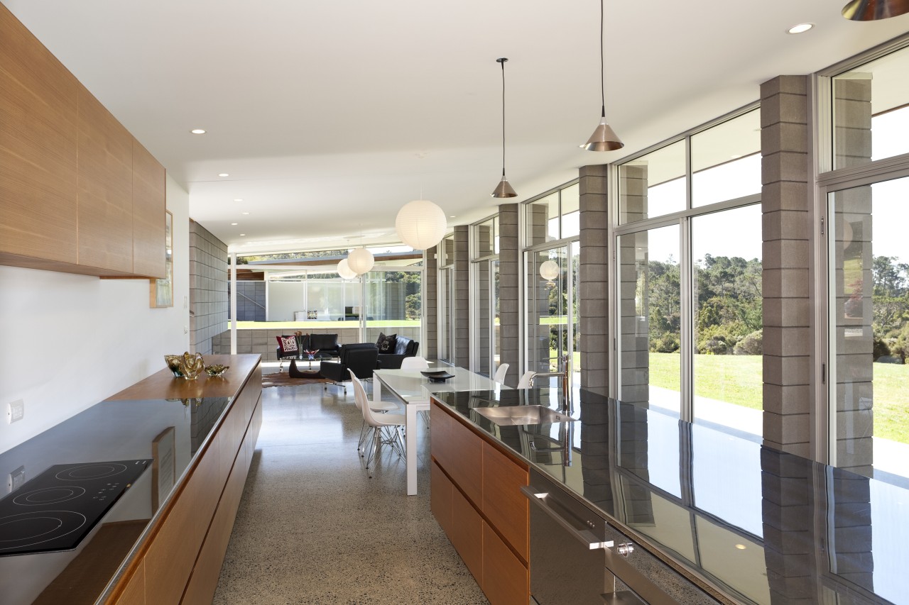 Concrete block columns, walls of glazing and a countertop, house, interior design, kitchen, real estate, white