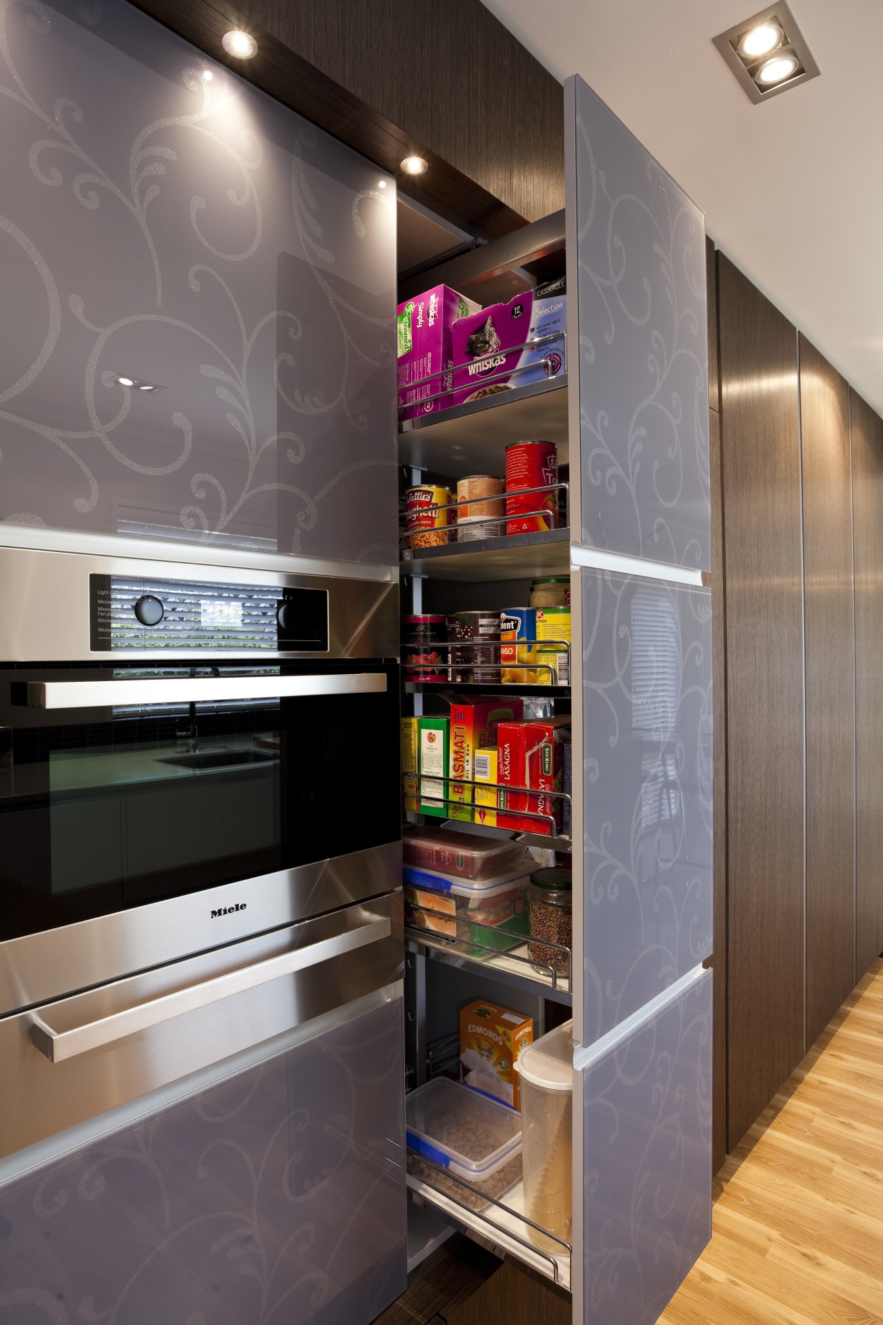 A large glass panel to the right of interior design, kitchen, gray