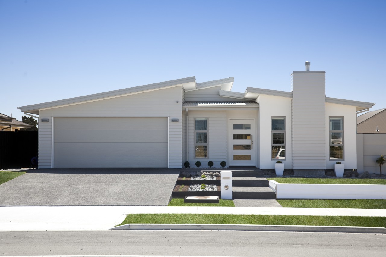 Exterior of a Stonewood Home. building, commercial building, elevation, estate, facade, home, house, property, real estate, residential area, gray, teal