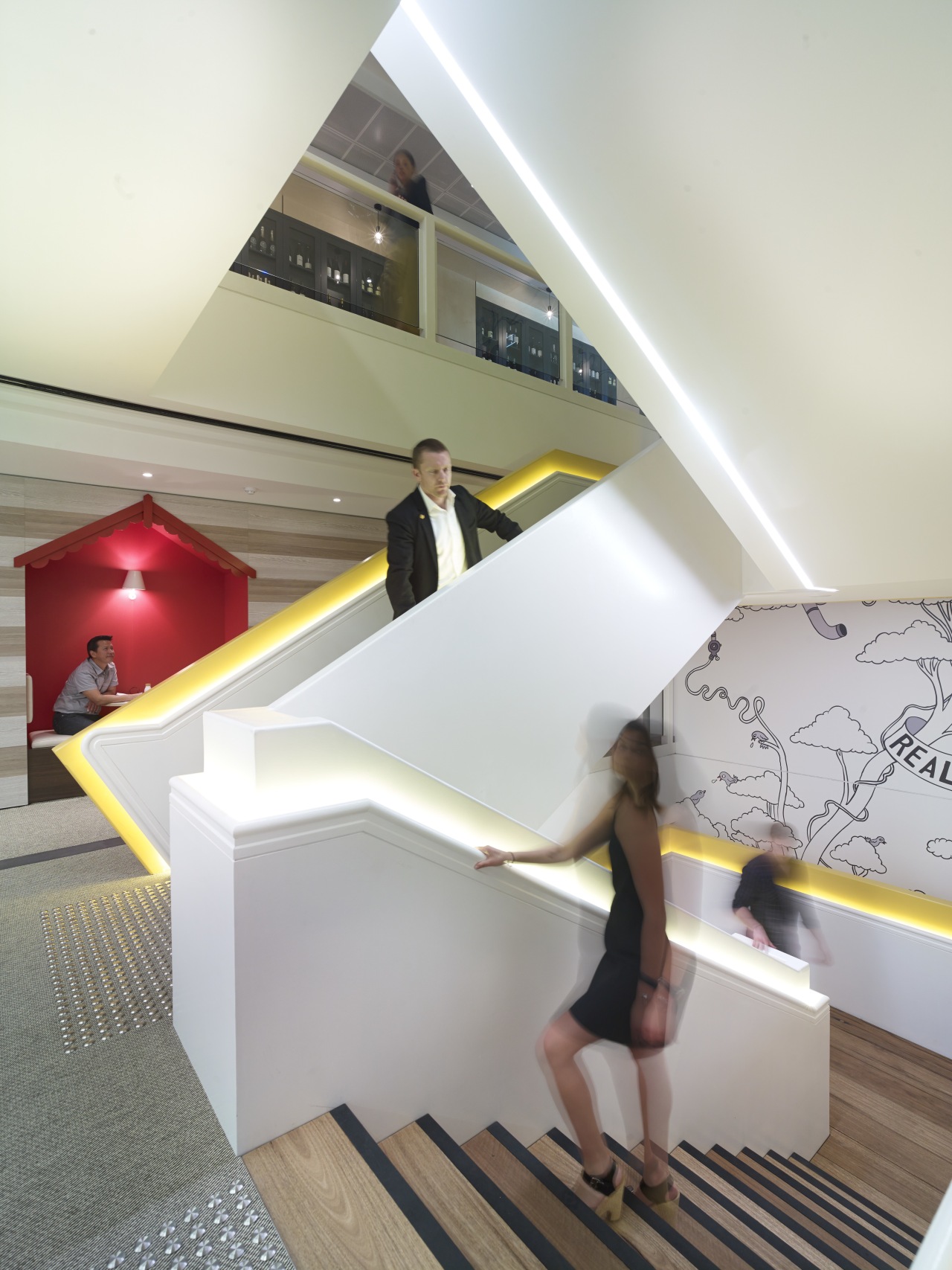 In the new Lion office fit-out in Sydney, architecture, ceiling, daylighting, design, floor, flooring, furniture, house, interior design, lighting, product design, room, stairs, table, white, gray