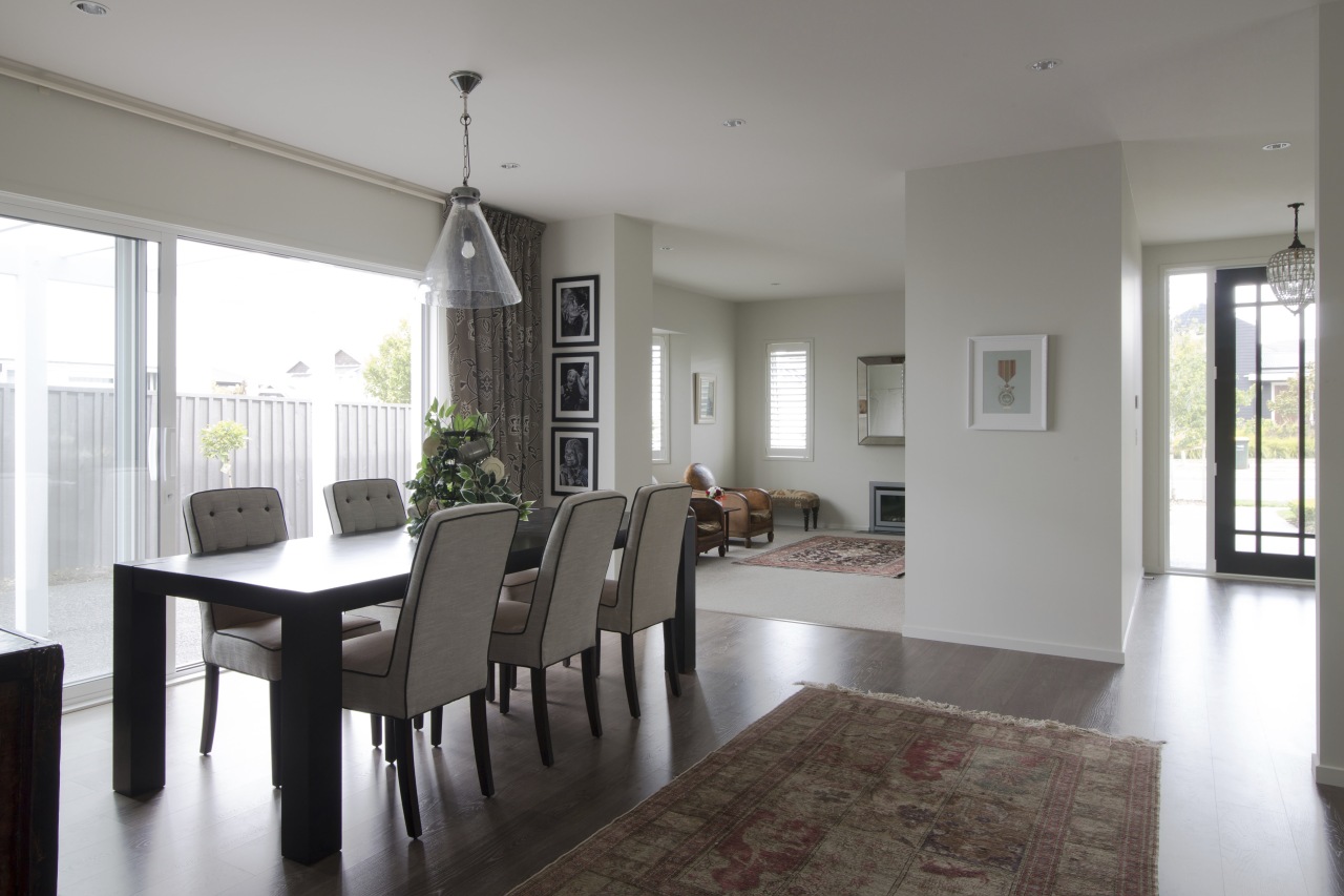 Landmark Homes show home at Karaka Lakes dining room, floor, flooring, house, interior design, living room, property, real estate, room, table, window, gray, white