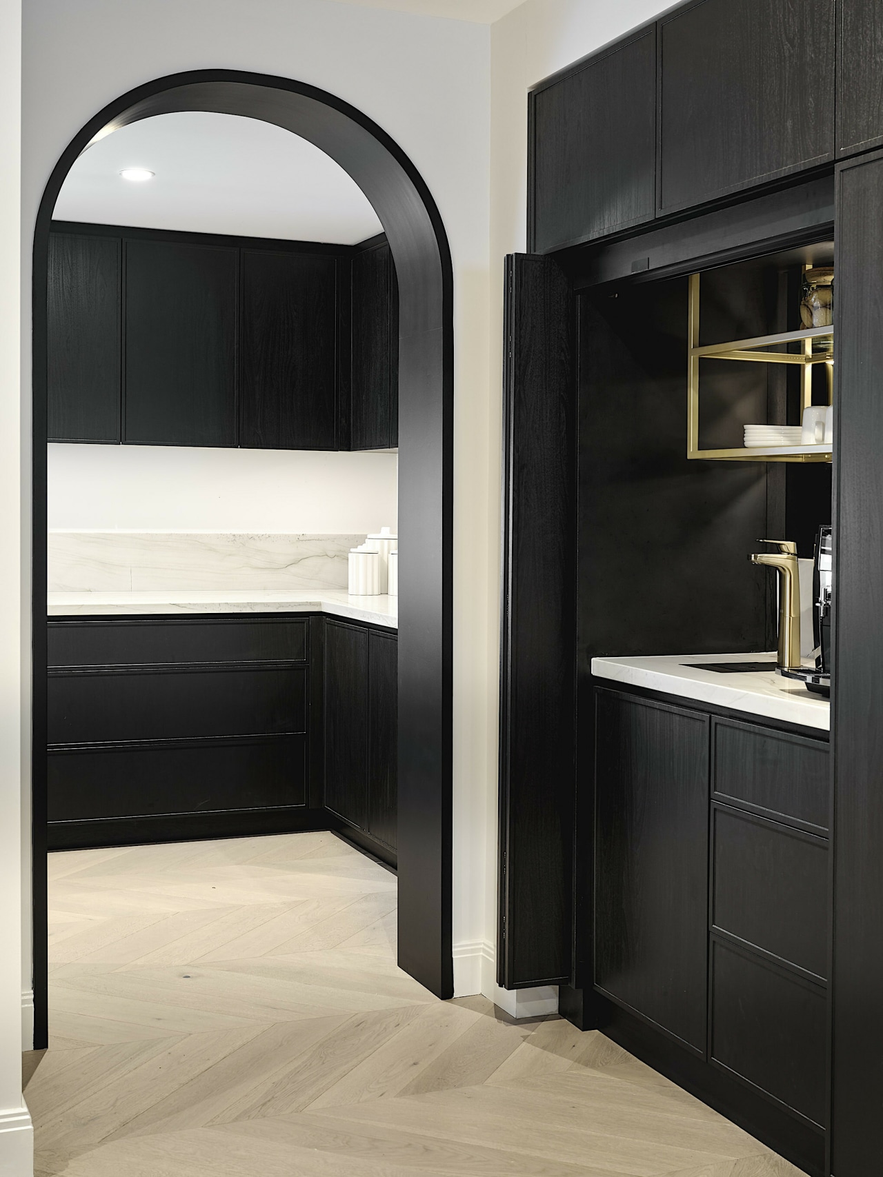 One of two archways leading to the scullery 