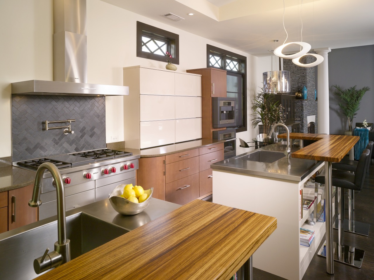 The dramatic grain in the zebrano wood in cabinetry, countertop, cuisine classique, home, interior design, kitchen, real estate, room, gray