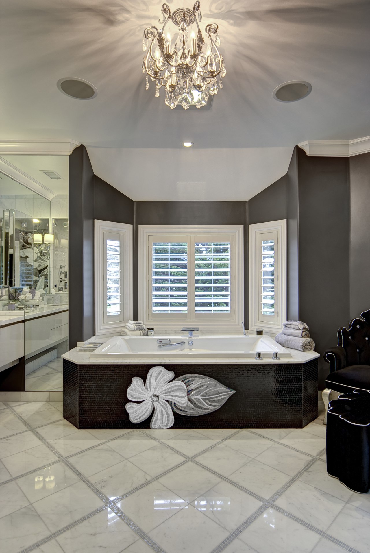 A spa bath with a flower-themed mosaic mural bathroom, ceiling, estate, floor, flooring, furniture, interior design, lobby, room, gray