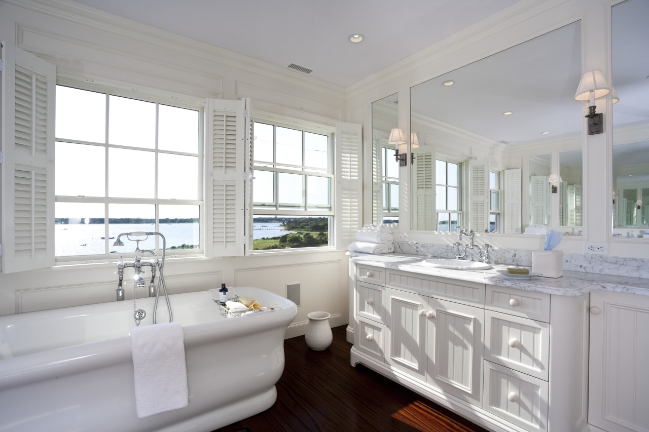 This master bathroom in a waterfront summer house bathroom, estate, home, interior design, property, real estate, room, sink, window, gray