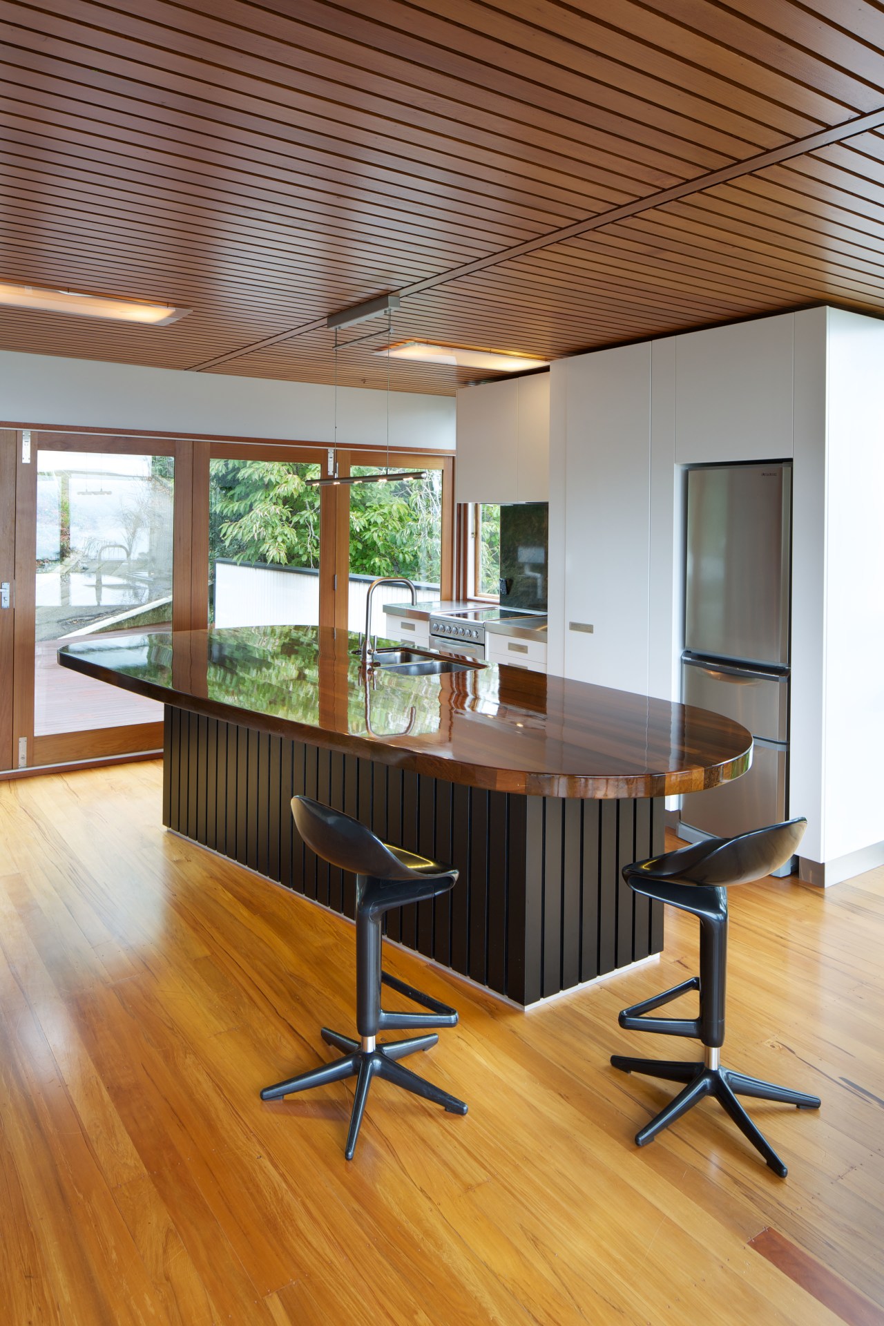 Black-painted tongue-and-groove boards on the base of the architecture, ceiling, chair, desk, floor, flooring, furniture, hardwood, house, interior design, laminate flooring, office, table, wood, wood flooring, brown, gray