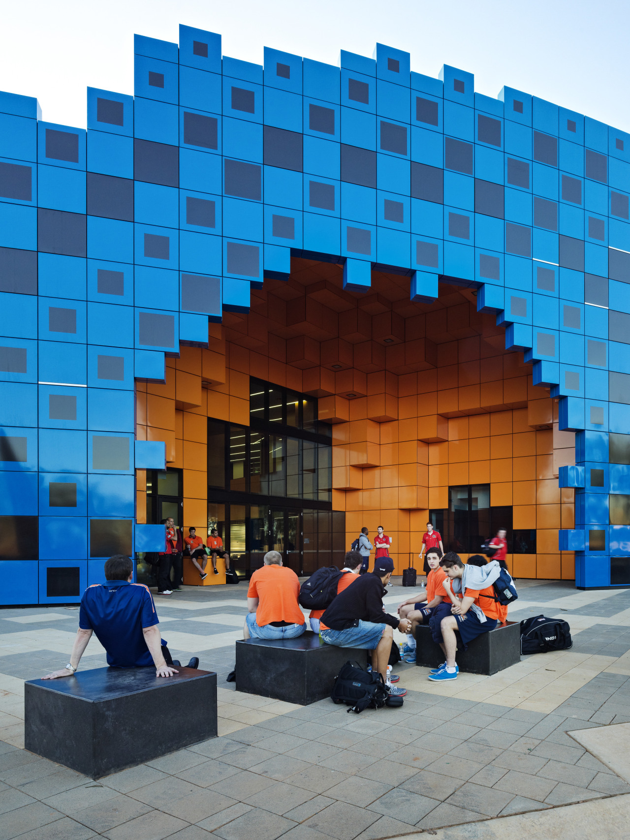 Desert storm Wanangkura Stadium by ARM Architecture architecture, blue, building, daytime, facade, leisure, sky, tourist attraction, wall, teal