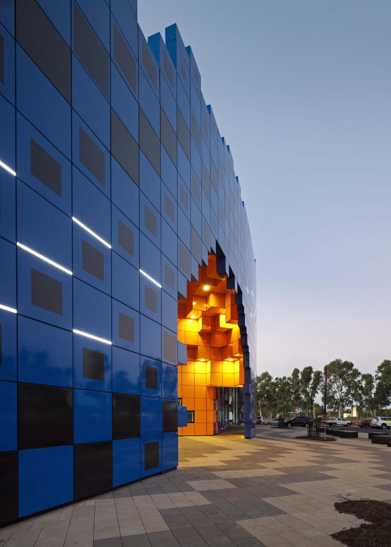 Desert storm Wanangkura Stadium by ARM Architecture architecture, blue, building, city, corporate headquarters, daytime, facade, headquarters, landmark, metropolitan area, reflection, sky, skyscraper, sunlight, tower block, urban area, blue, teal