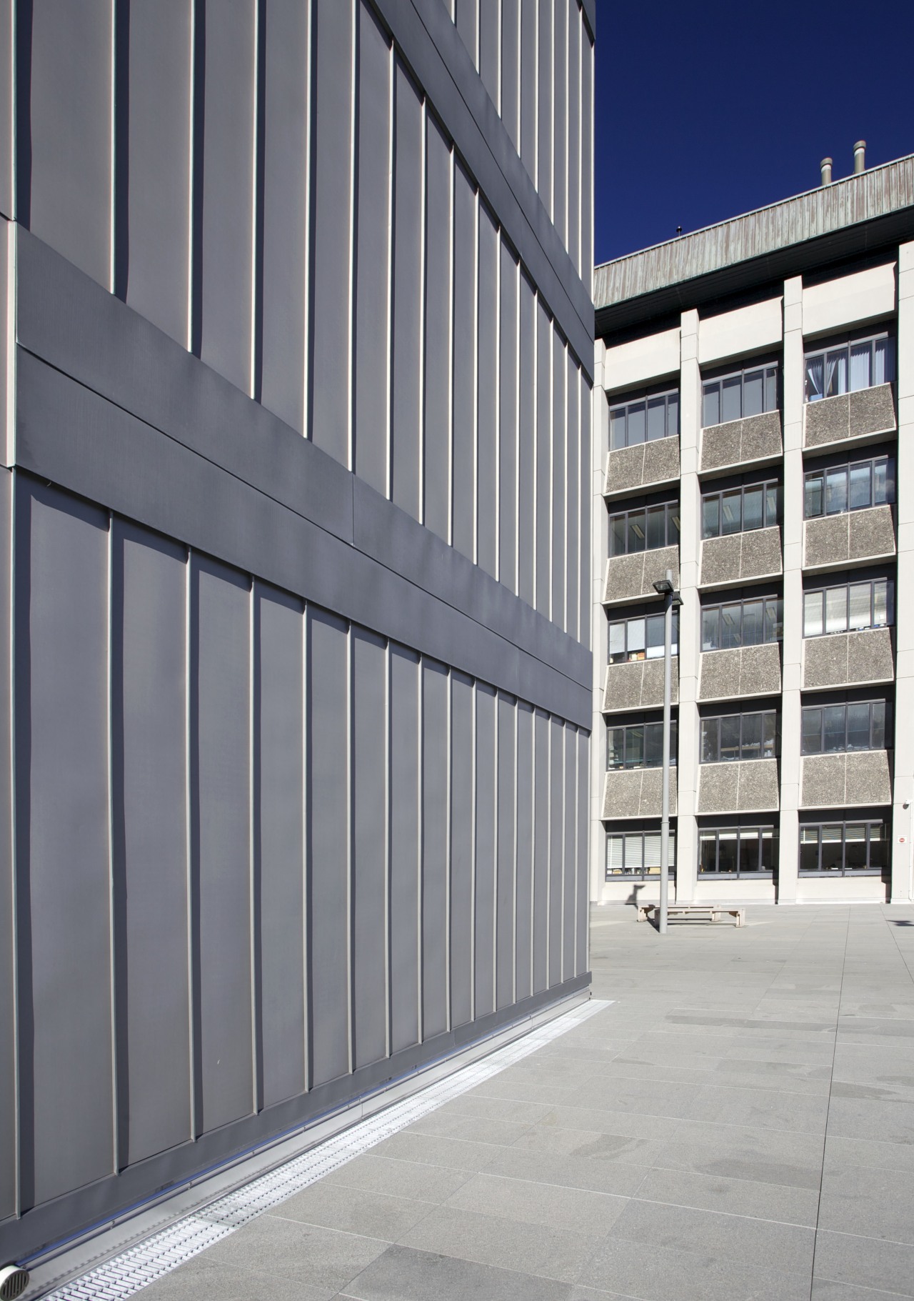 Keeping up appearances  cladding by Metal Design architecture, building, commercial building, corporate headquarters, daytime, facade, headquarters, line, residential area, structure, gray