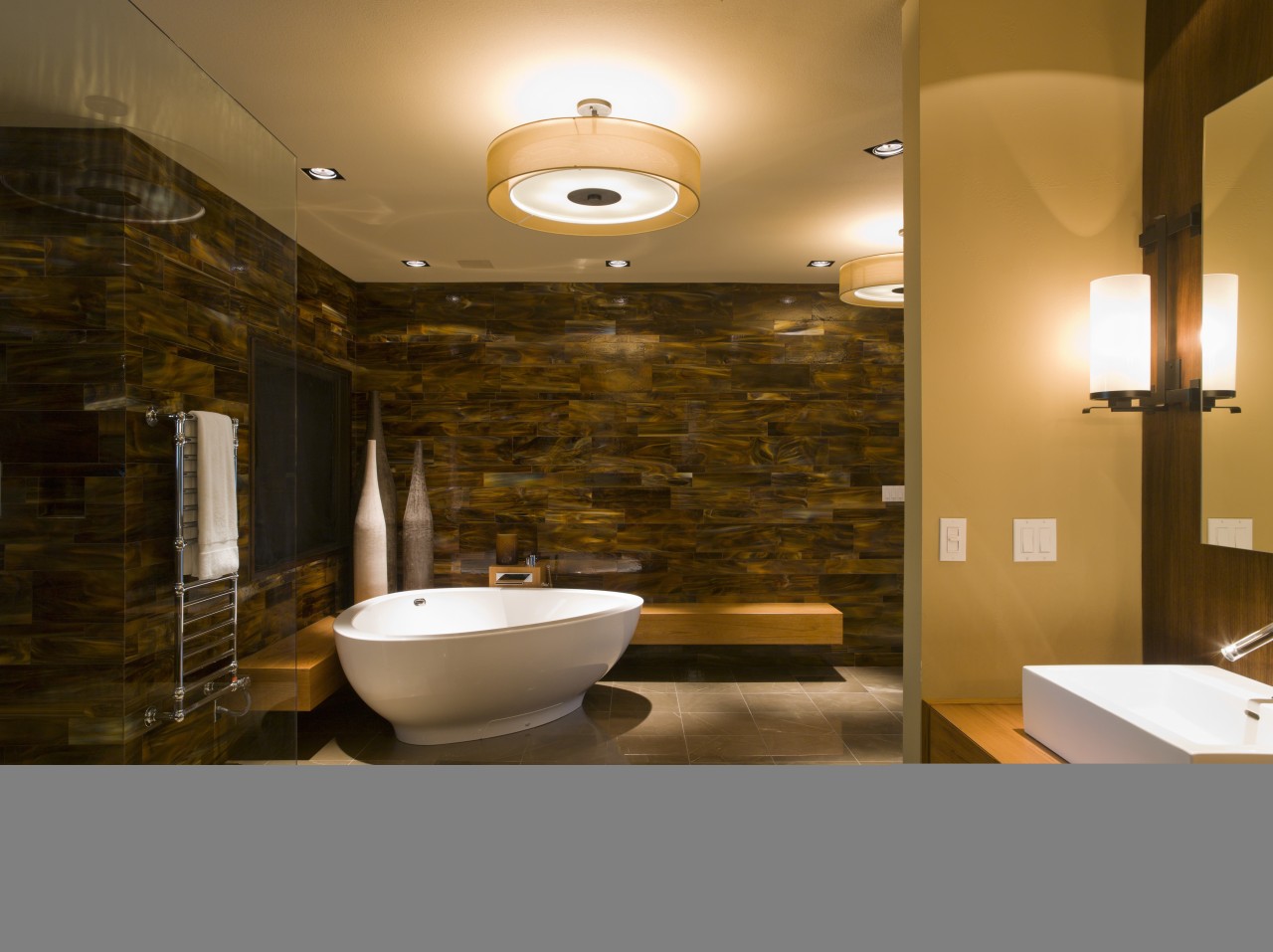 This remodeled bathroom features dramatic tortoiseshell glass wall architecture, bathroom, ceiling, interior design, lighting, room, wall, brown