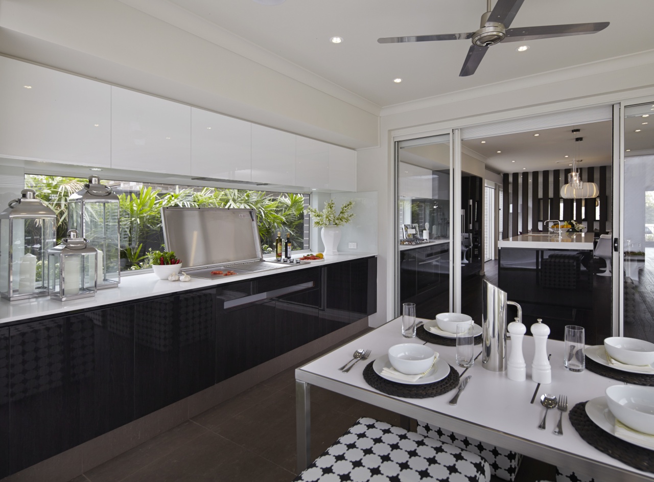 Alfresco dining is set off the kitchen area countertop, interior design, kitchen, property, real estate, window, gray, black