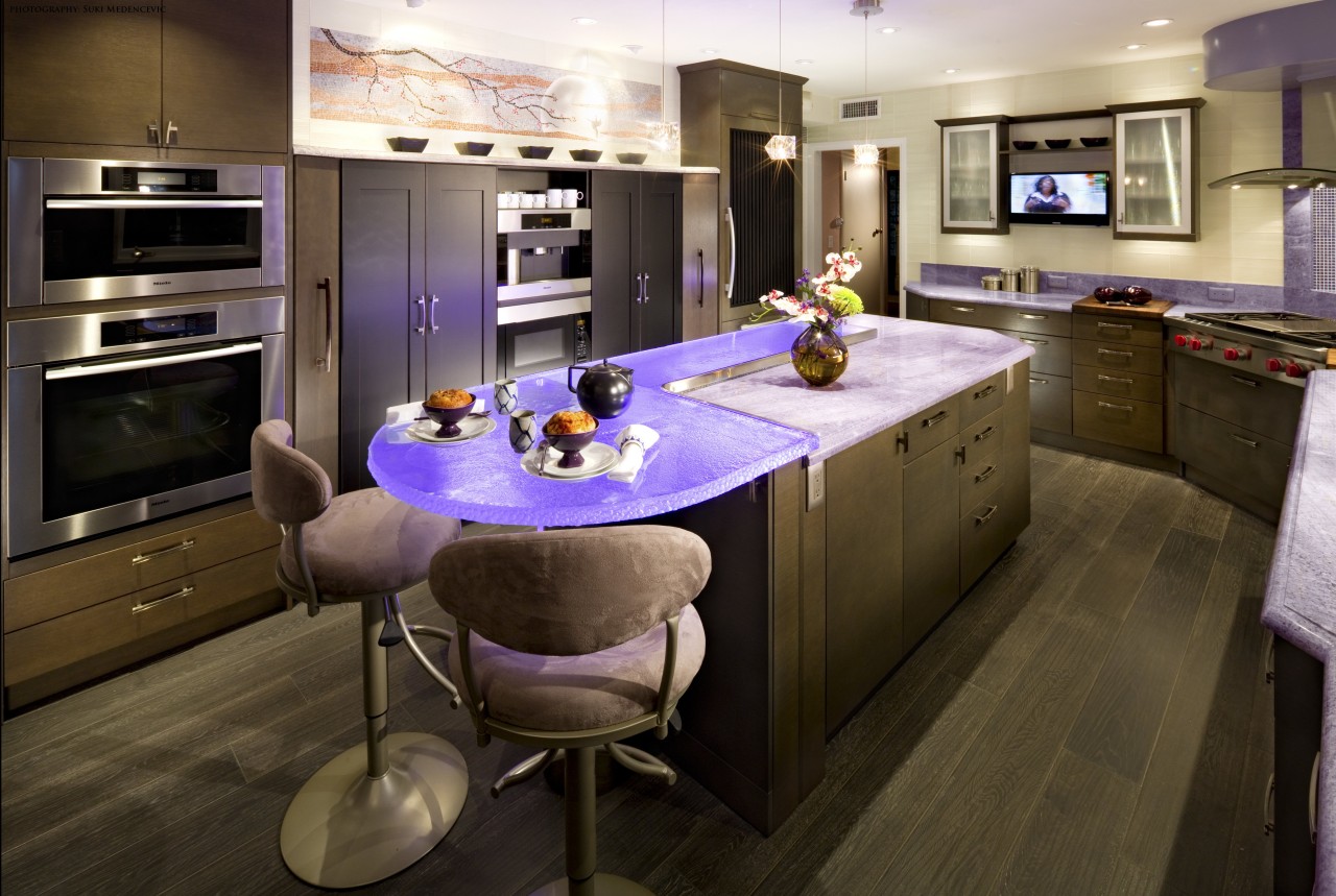 Glass benchtops illuminated with violet lighting ensure this countertop, interior design, kitchen, room, brown