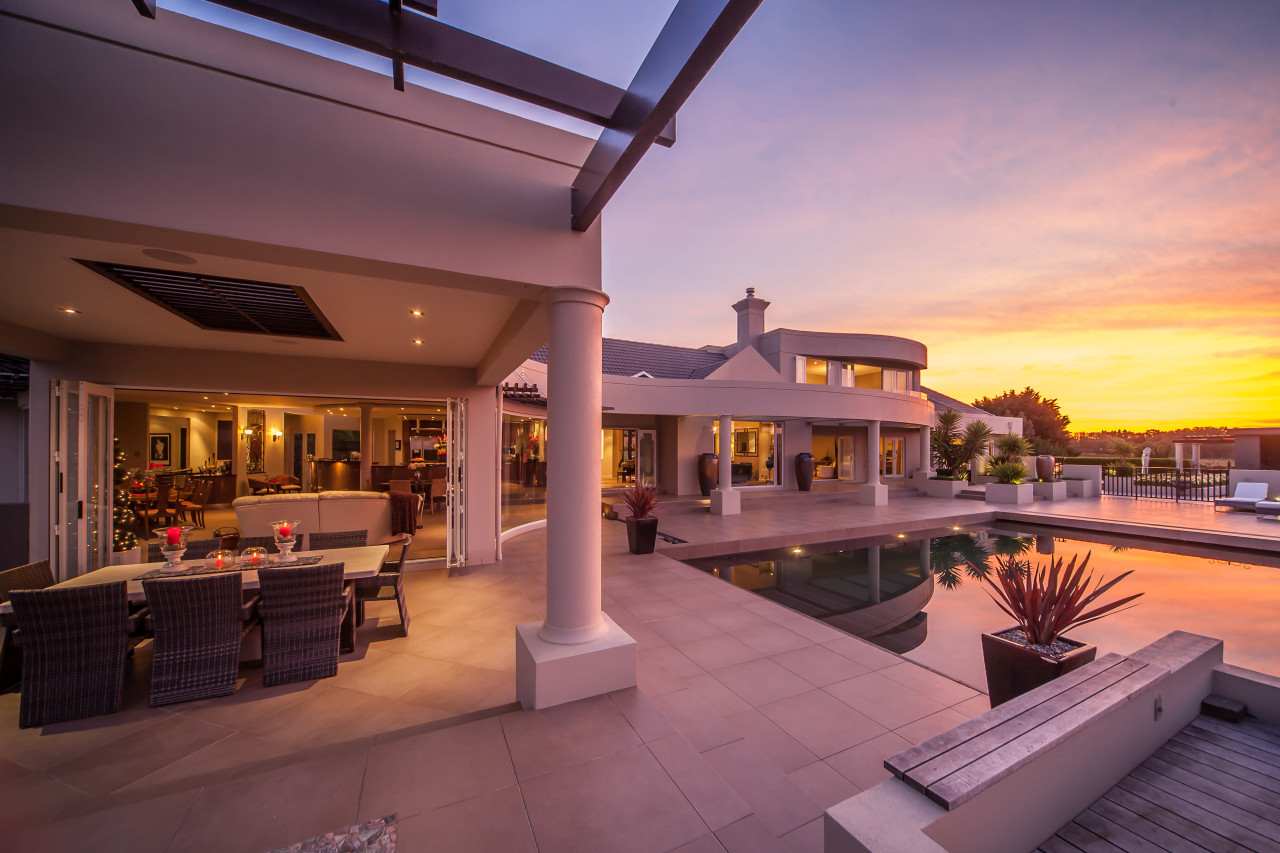Entertainers' delight a major renovation to this apartment, condominium, estate, home, hotel, house, interior design, leisure, property, real estate, resort, sky, villa, red