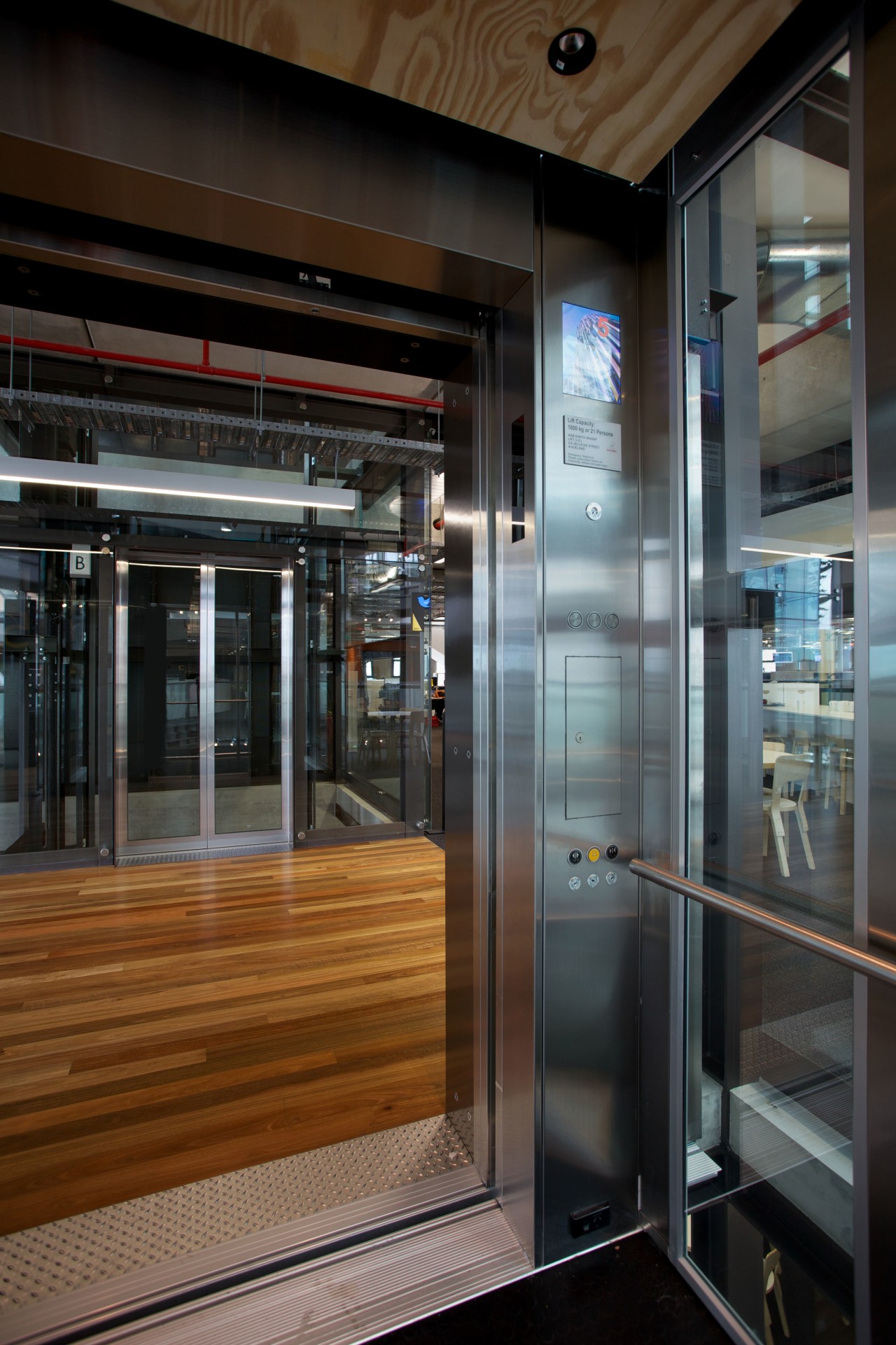 Schindler Lifts NZ supplied and installed three Schindler door, glass, interior design, black