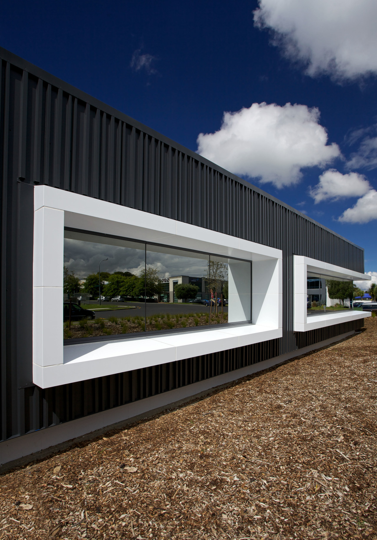 An architectural metal facade by Metal Design Solutions architecture, facade, home, house, sky, window, black