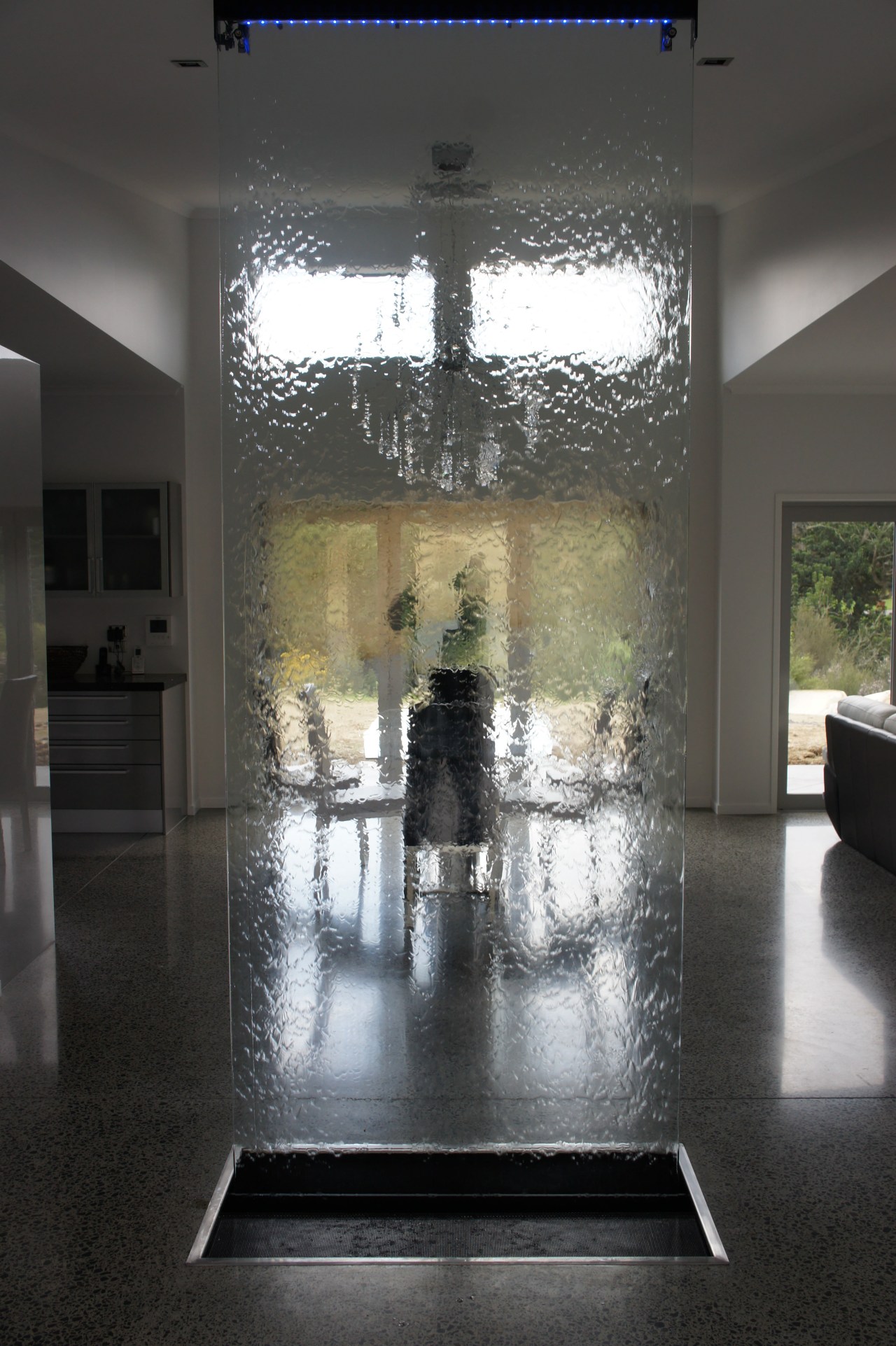 Waterworks indoor water feature. A shimmering sheet architecture, ceiling, floor, flooring, glass, interior design, lobby, tourist attraction, wall, black