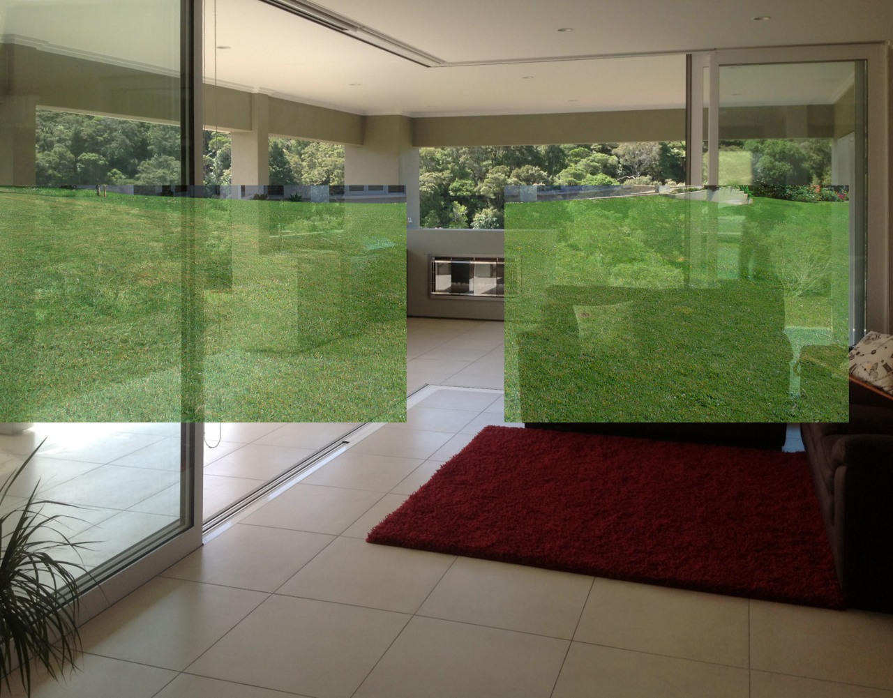 Northland show home open to outdoors.  To floor, flooring, glass, grass, green, home, house, interior design, plant, property, real estate, wall, window, gray