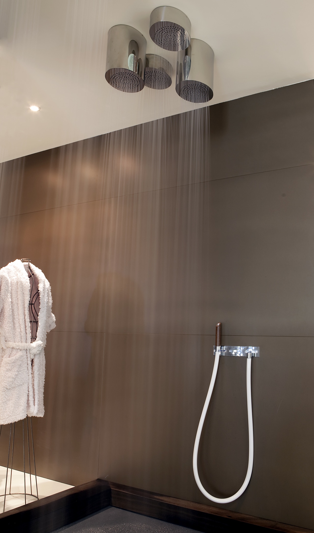 Gessi Seni shower shown with round showerhead bathroom, ceiling, floor, flooring, interior design, light fixture, lighting, plumbing fixture, product design, room, tap, tile, brown, gray