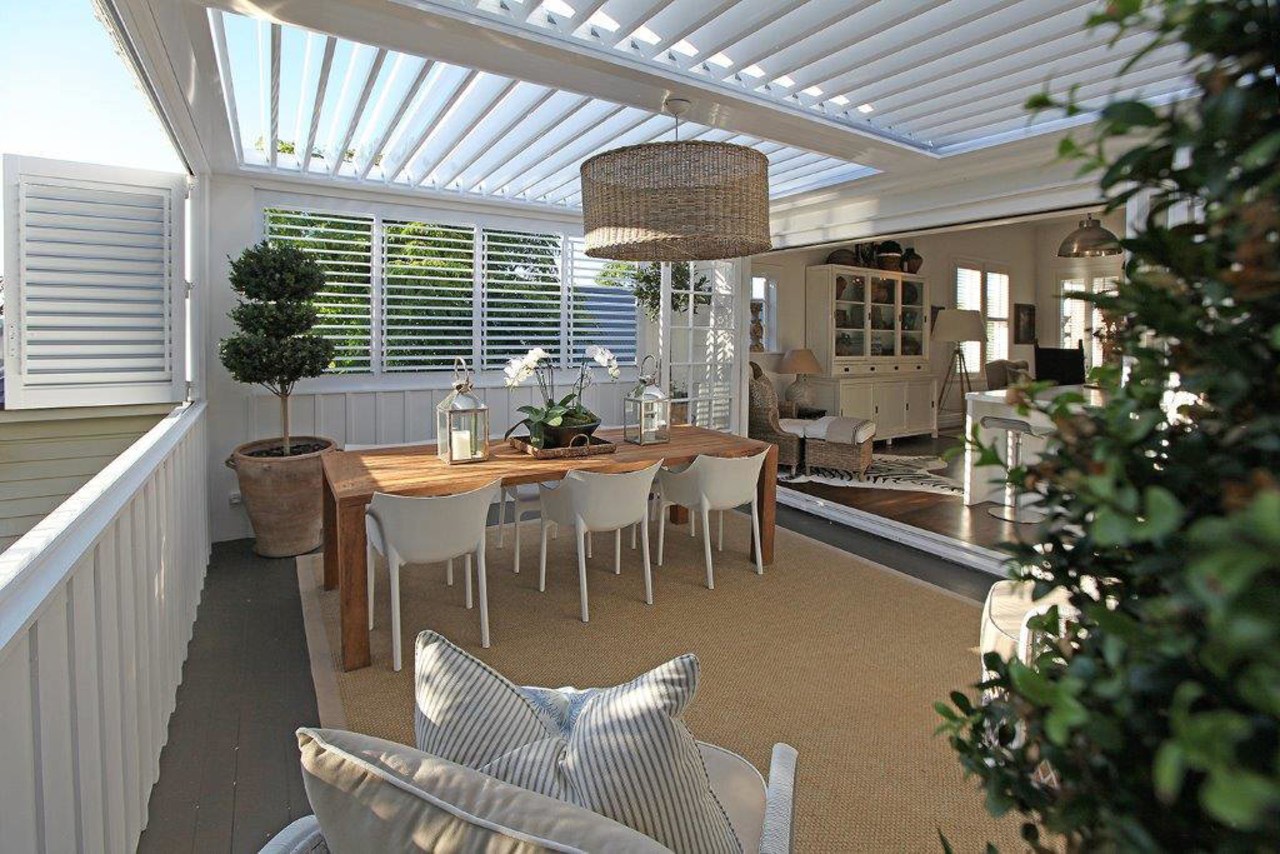 Kudos Aluminium Lovres off motorised and fixed versions. backyard, daylighting, home, house, interior design, outdoor structure, patio, property, real estate, roof, window, gray