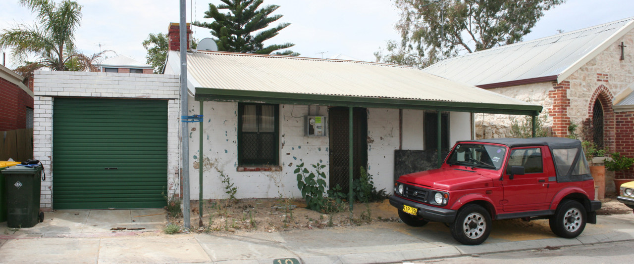 Before renovation the render on this cottage covered automotive exterior, car, family car, home, house, luxury vehicle, property, real estate, roof, shed, vehicle, white