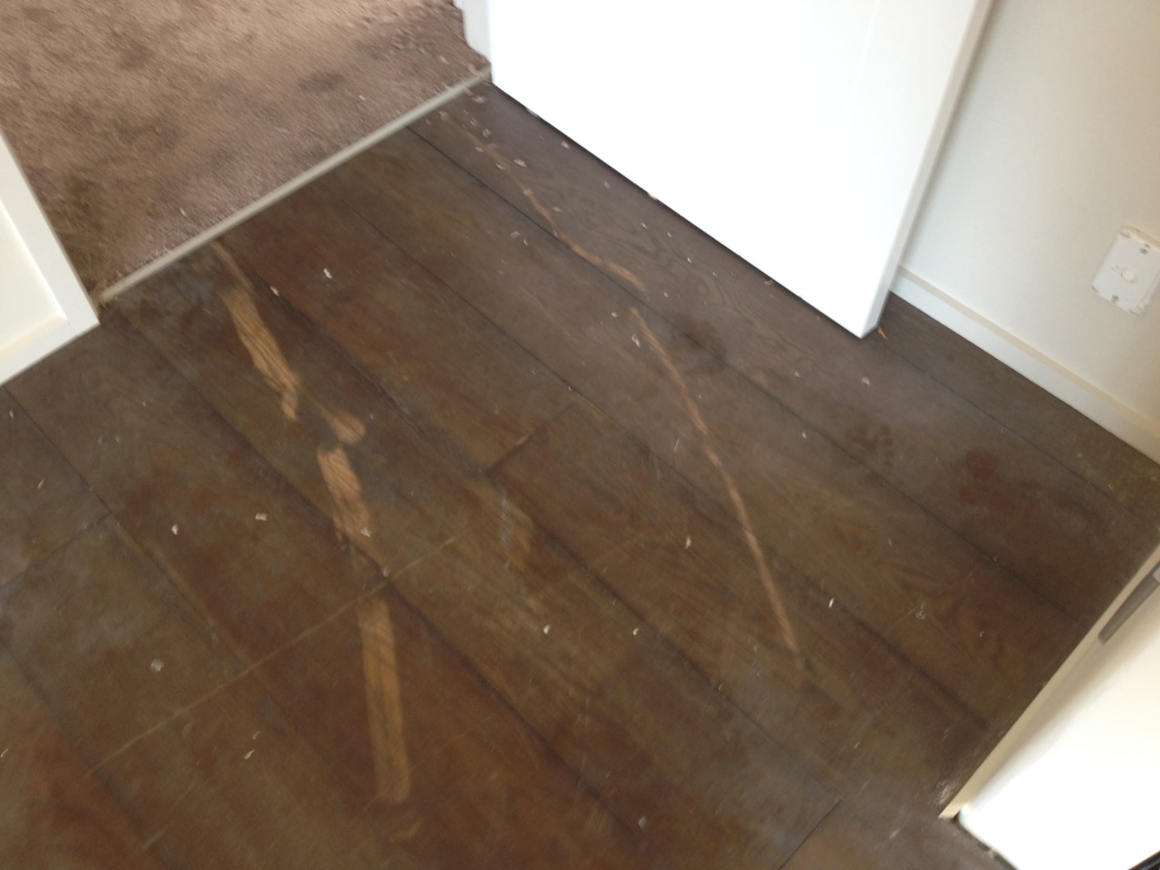 Before image: this original hardwood floor is extensively floor, flooring, hardwood, laminate flooring, plywood, tile, wood, wood flooring, wood stain, brown