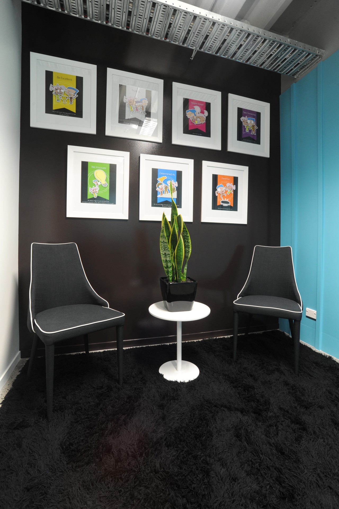 This 20m wall in the new Auckland office chair, floor, furniture, interior design, office, product design, table, wall, black