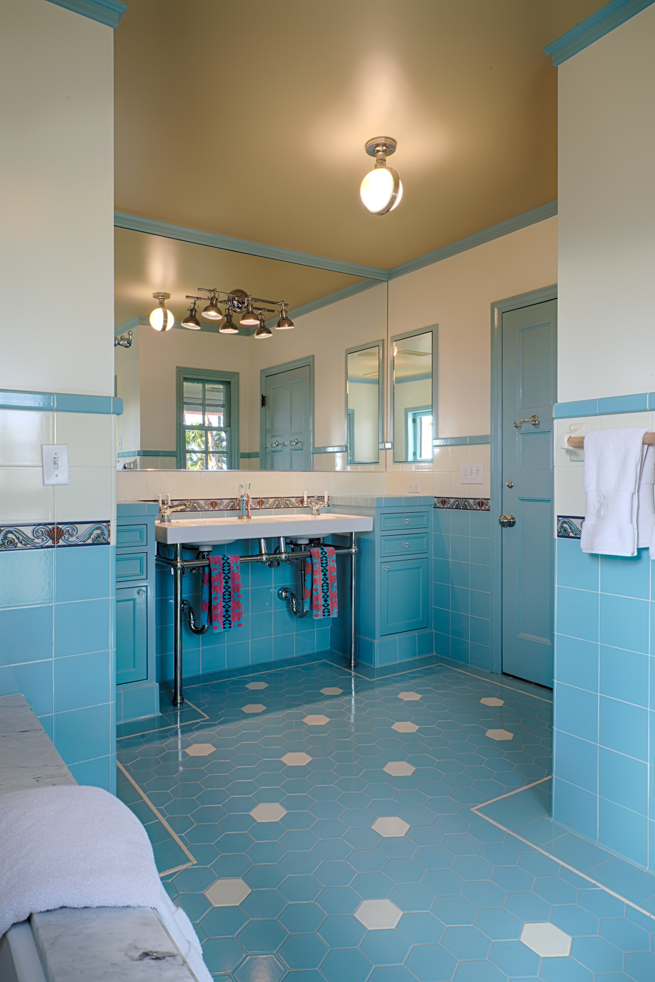 The family bathroom in architect Linda Brettlers own architecture, bathroom, blue, ceiling, floor, flooring, home, house, interior design, kitchen, real estate, room, tile, gray, teal