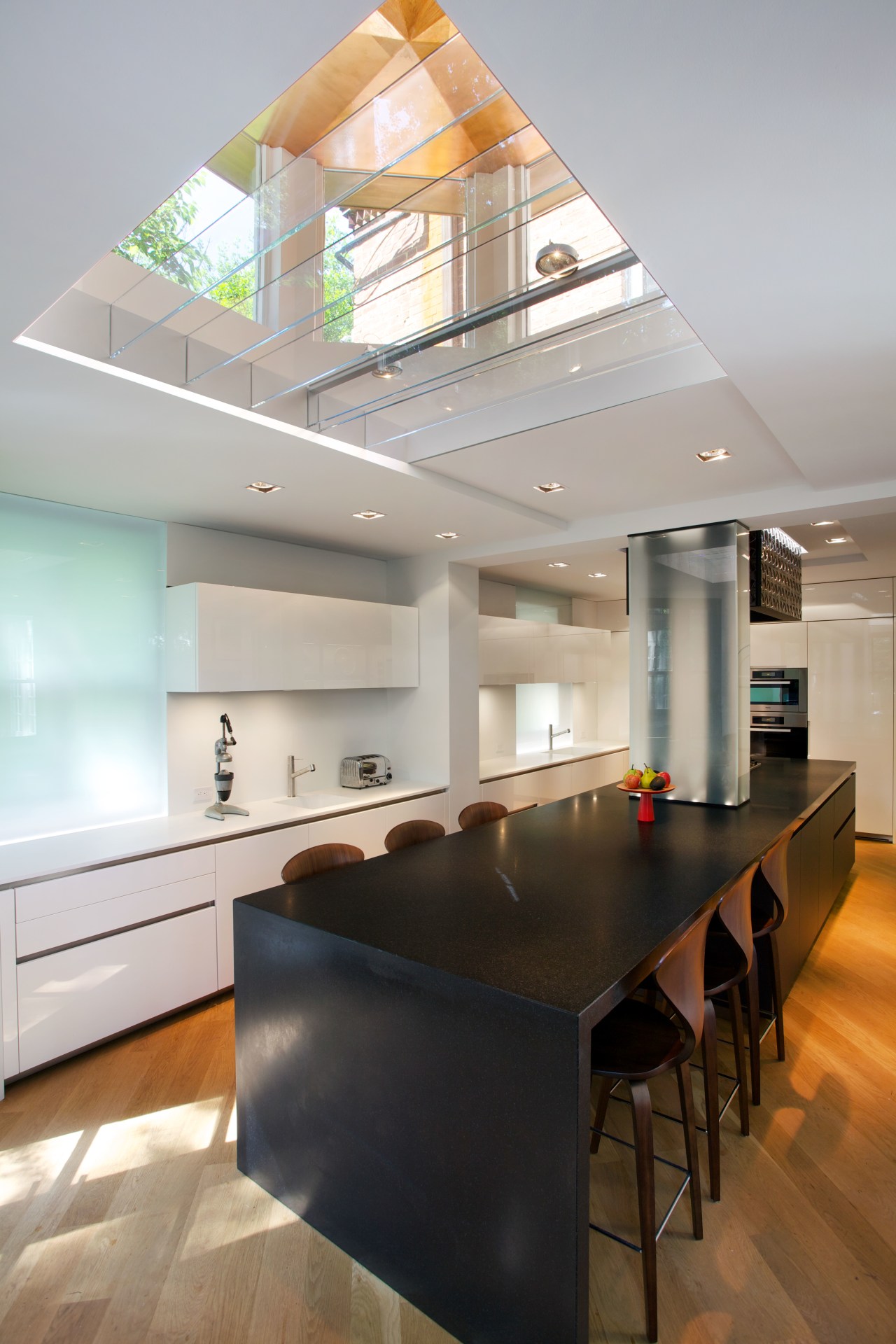 An existing lantern light above the island was architecture, ceiling, countertop, daylighting, house, interior design, kitchen, real estate, table, gray