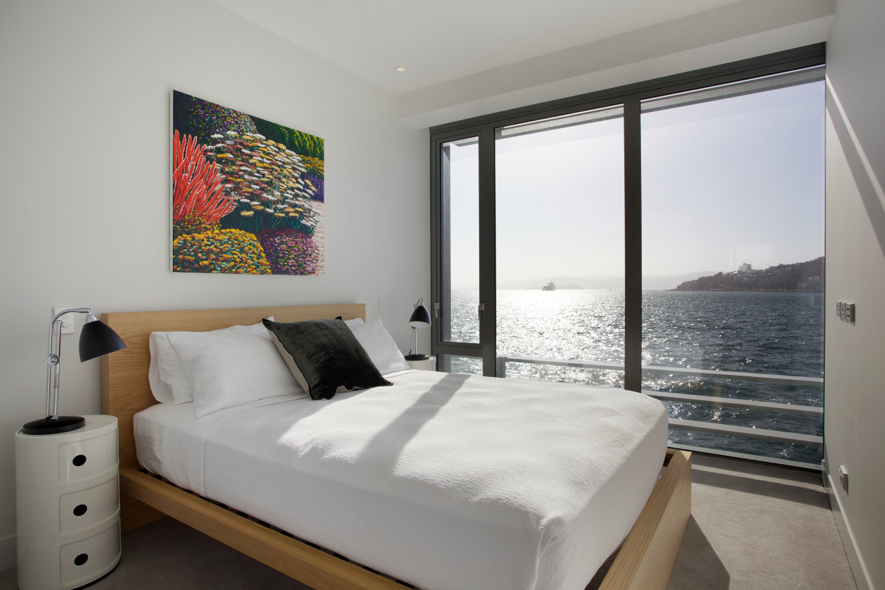 Bedrooms in the Clyde Quay Wharf apartment development bed frame, bedroom, home, interior design, property, real estate, room, suite, wall, window, gray