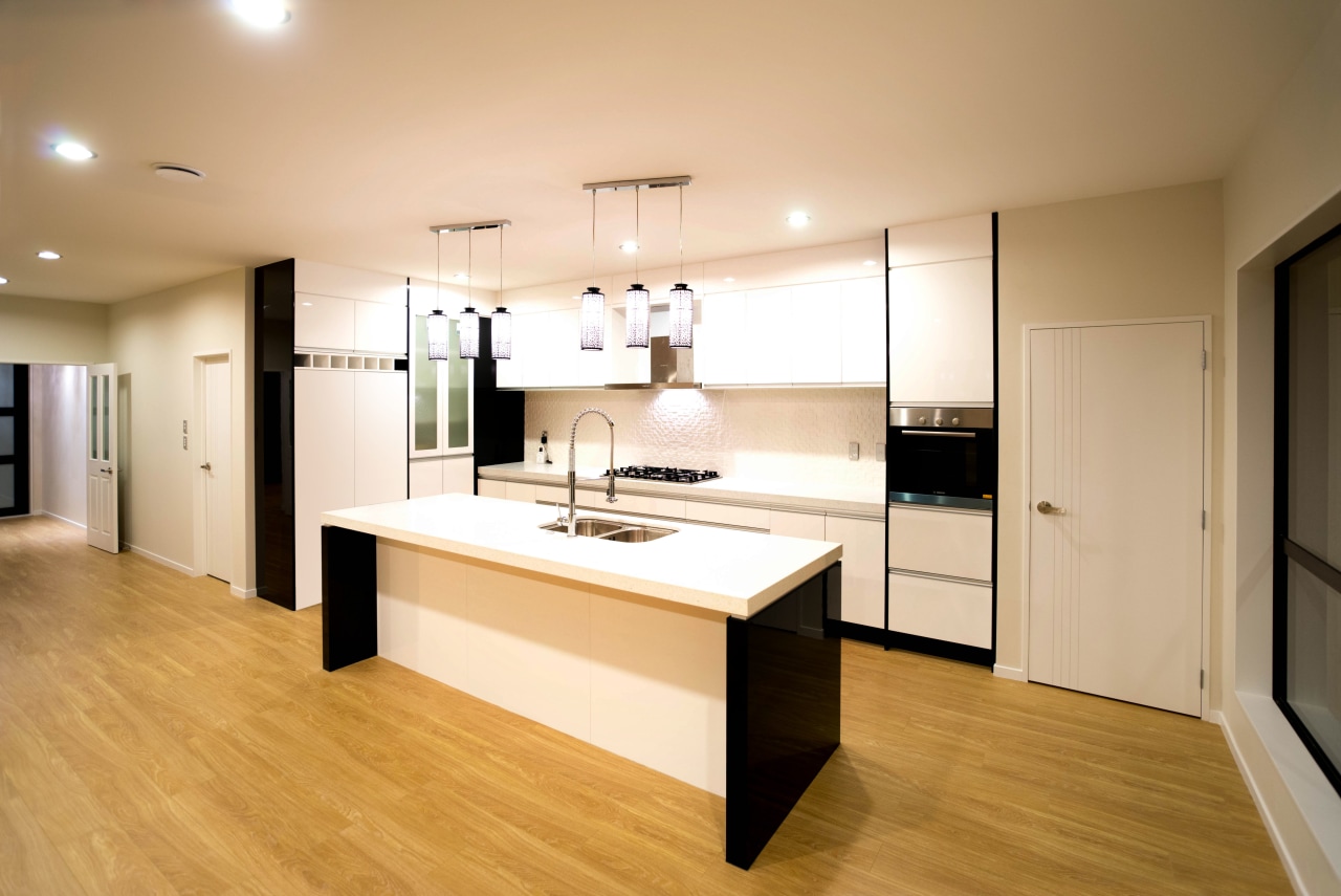 Beautiful kitchens dont just happen by accident cabinetry, countertop, floor, flooring, hardwood, interior design, kitchen, laminate flooring, real estate, room, wood, wood flooring, orange, white