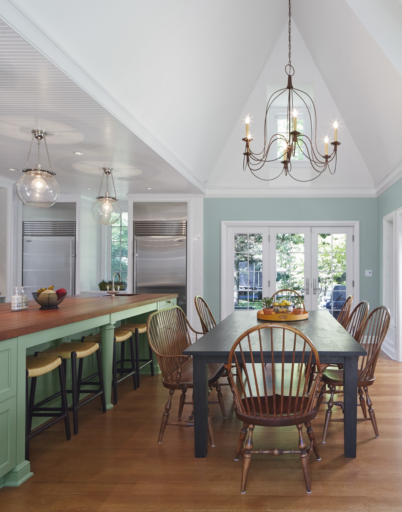 A high ceiling demarcates the breakfast area from ceiling, dining room, floor, hardwood, home, interior design, living room, real estate, room, table, wall, wood flooring, gray