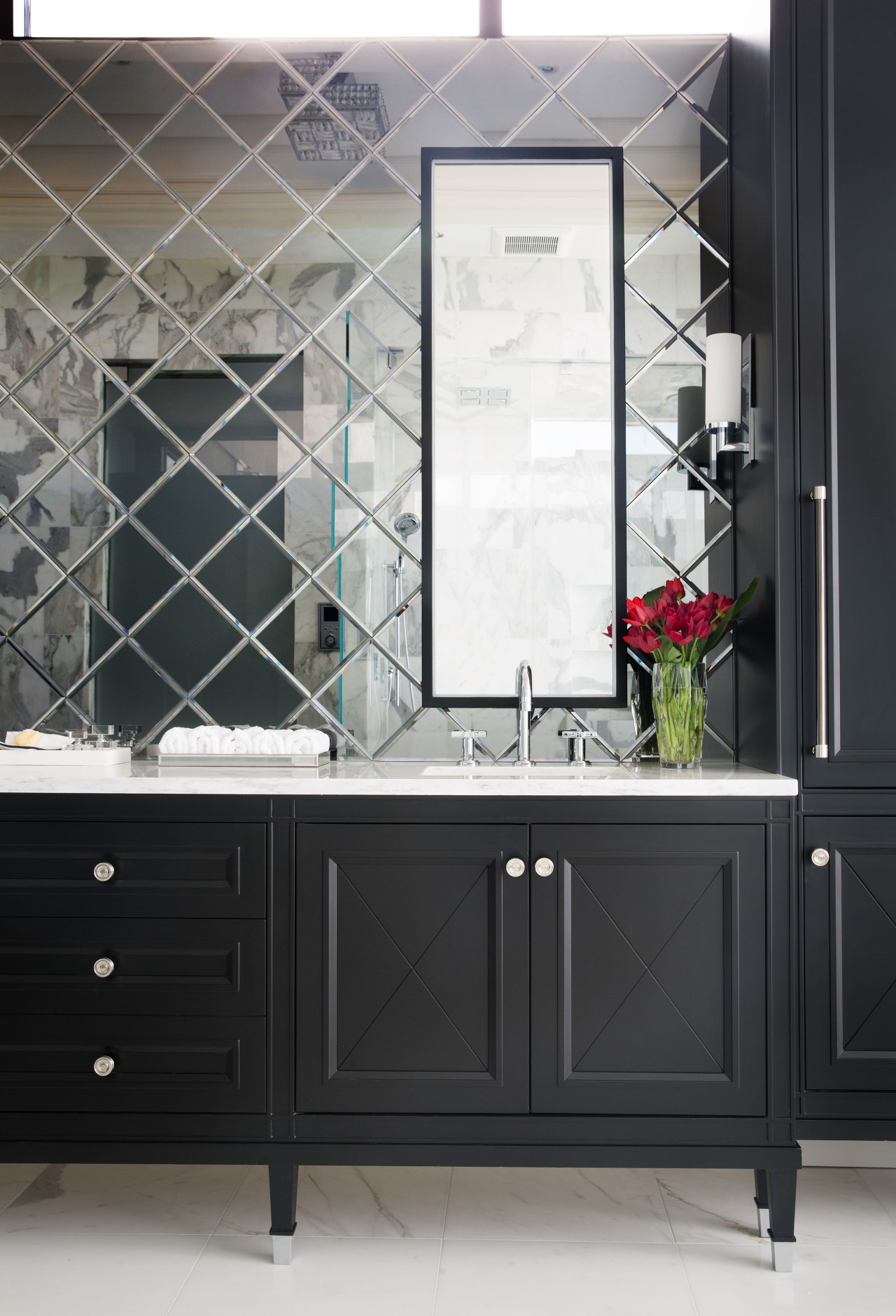 While the lacquered maple vanity in this master bathroom, bathroom accessory, bathroom cabinet, interior design, sink, black, white