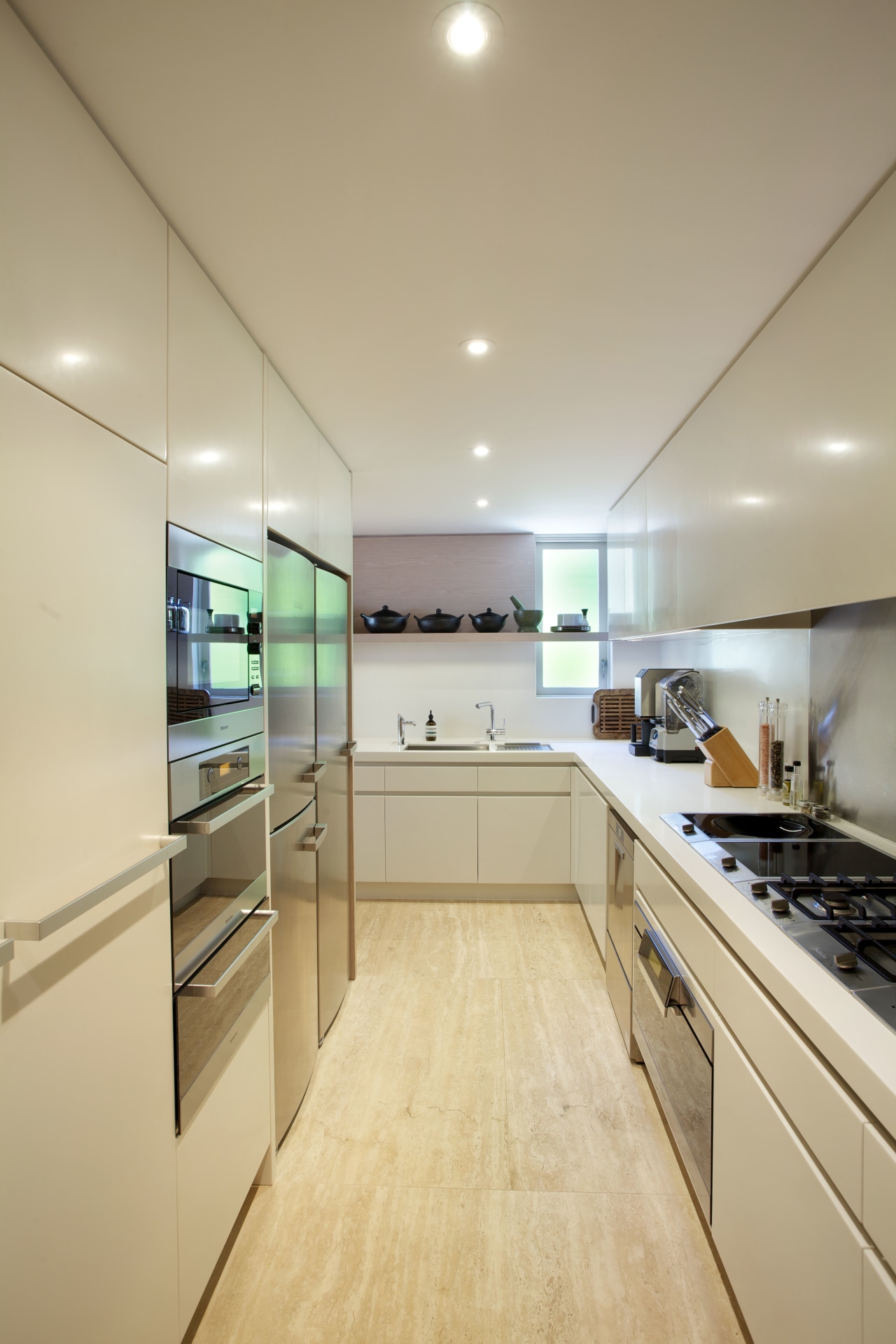 A second kitchen in this renovated house runs cabinetry, ceiling, countertop, cuisine classique, interior design, kitchen, real estate, room, orange