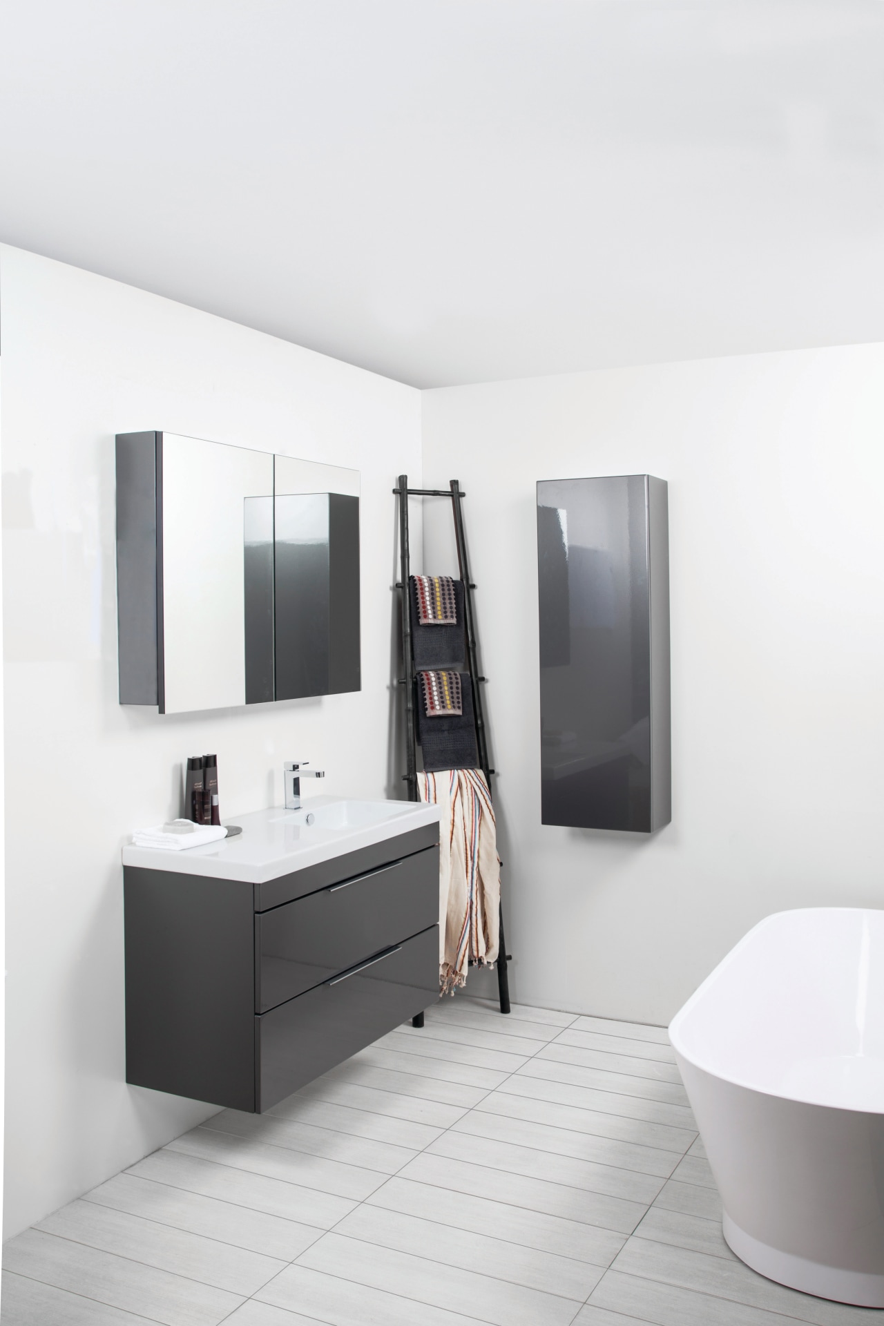 This bathroom highlights Adesso bathroomware, which combines European bathroom, bathroom accessory, bathroom cabinet, floor, interior design, plumbing fixture, product design, room, sink, tap, white