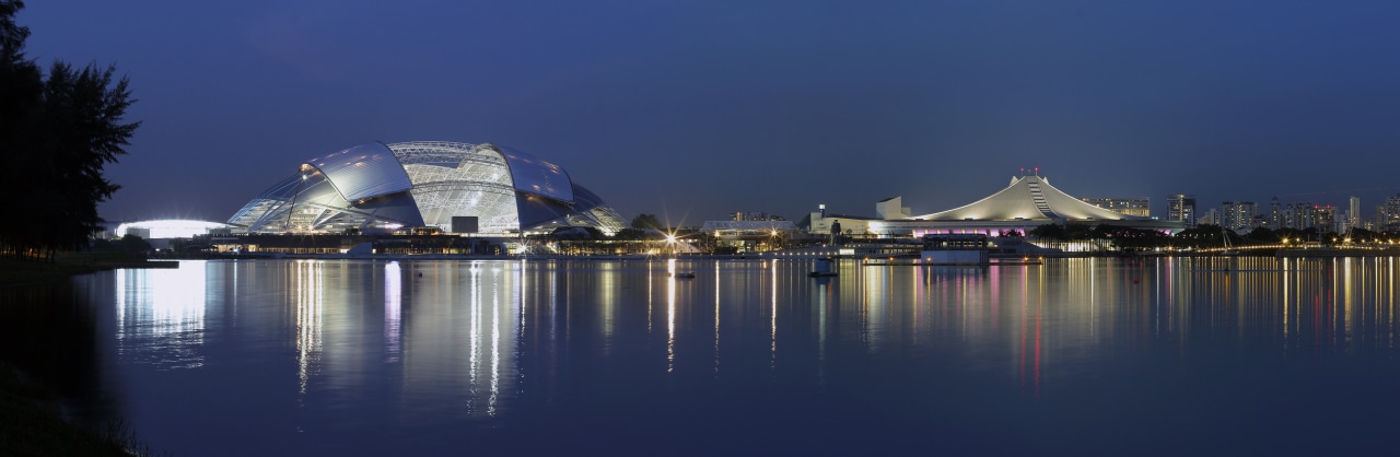 With its illuminated dome and ribbons of lights, city, cityscape, evening, landmark, metropolis, night, opera, reflection, sky, skyline, structure, tourism, tourist attraction, water, blue