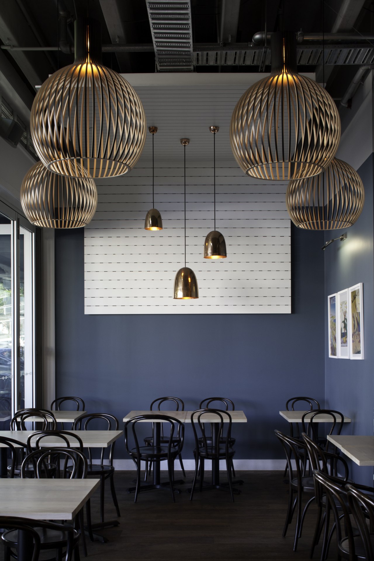 Resene San Juan is the feature colour, with ceiling, chandelier, dining room, furniture, interior design, lamp, light fixture, lighting, lighting accessory, restaurant, table, black