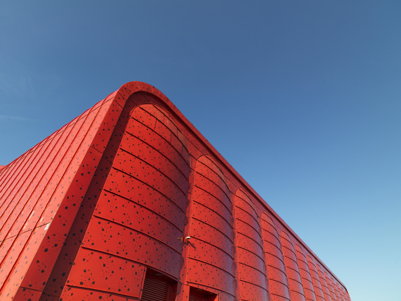 Euramax colour-coated aluminium is available in a wide angle, architecture, building, daytime, facade, landmark, line, red, roof, sky, skyscraper, structure, teal, red